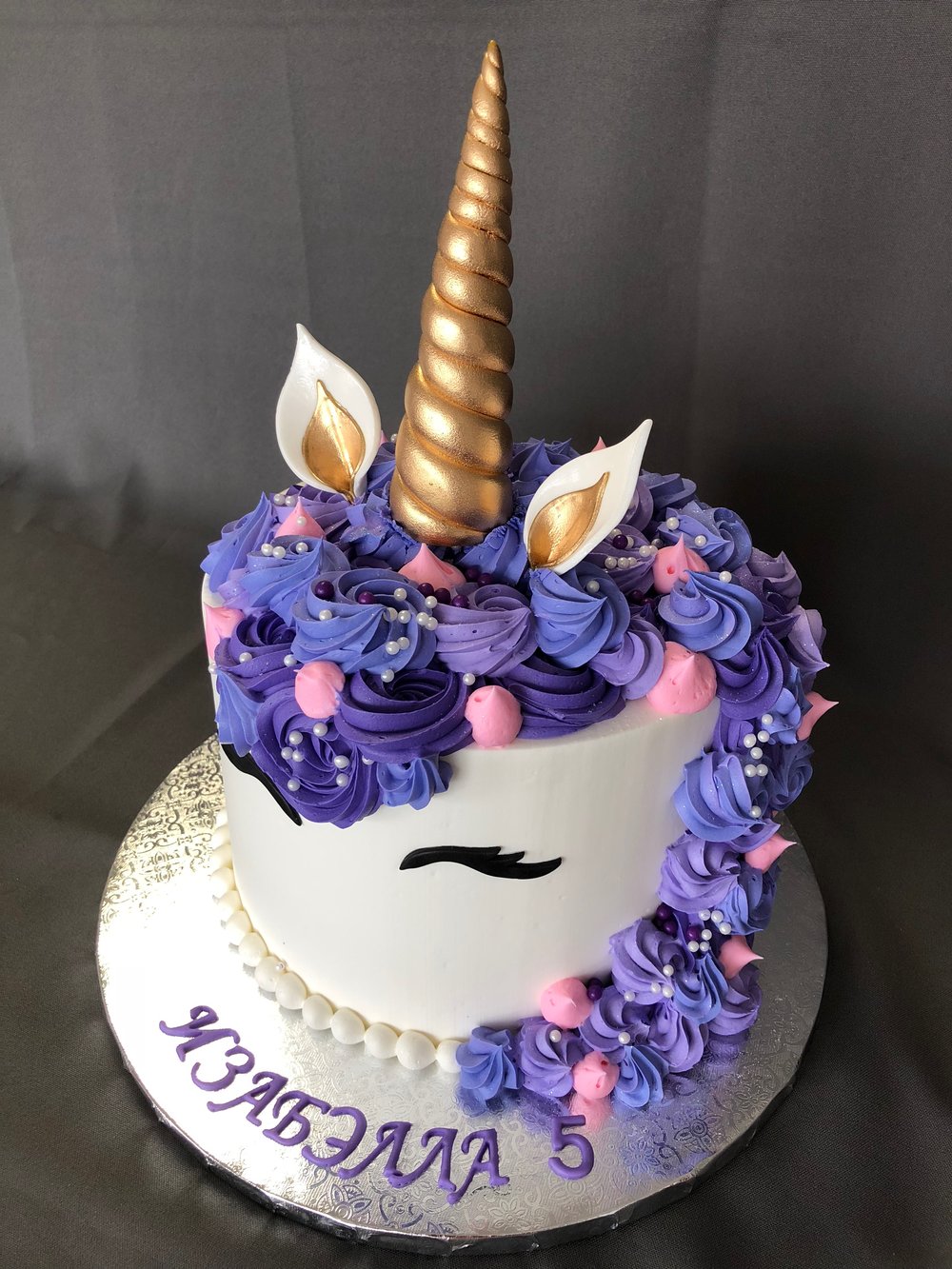 Gourmet Unicorn Cake With Pink And Purple Buttercream Frosting On Blue  Background. Stock Photo, Picture and Royalty Free Image. Image 111781302.