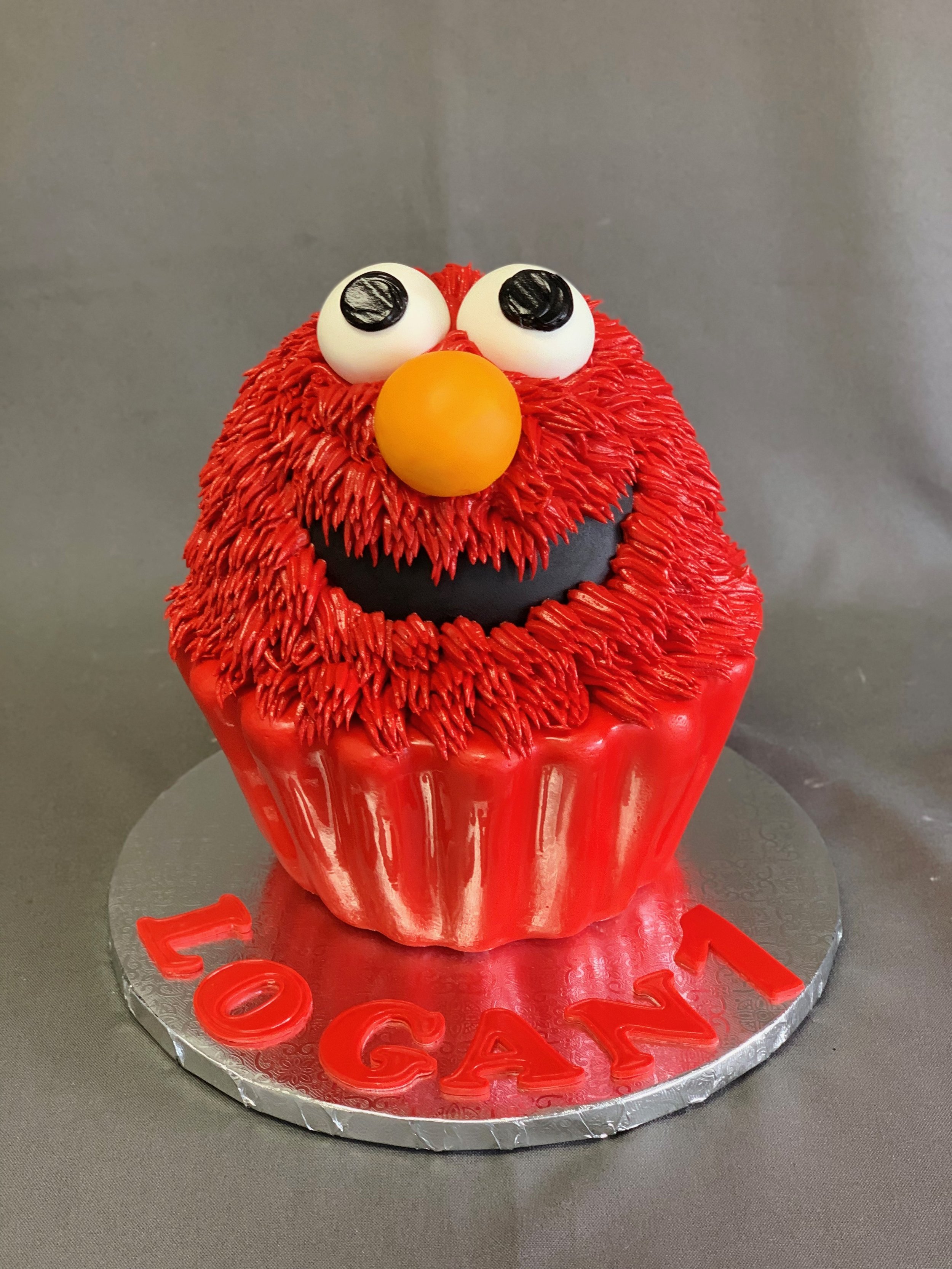 Elmo Cupcake — Skazka Desserts Bakery NJ Custom Birthday Cakes