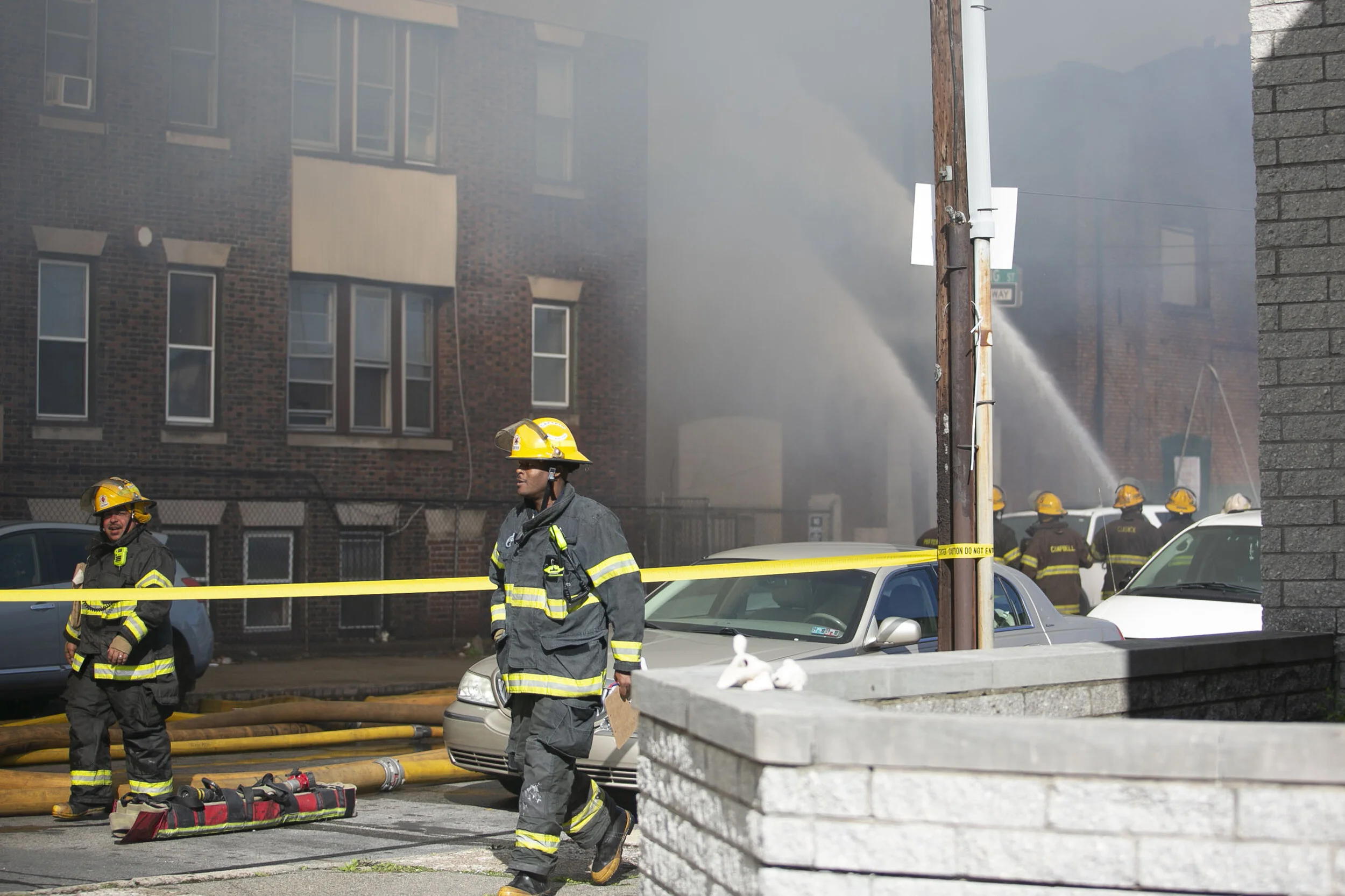  Fighter fighters work to suffocate a fire in West Philly. 