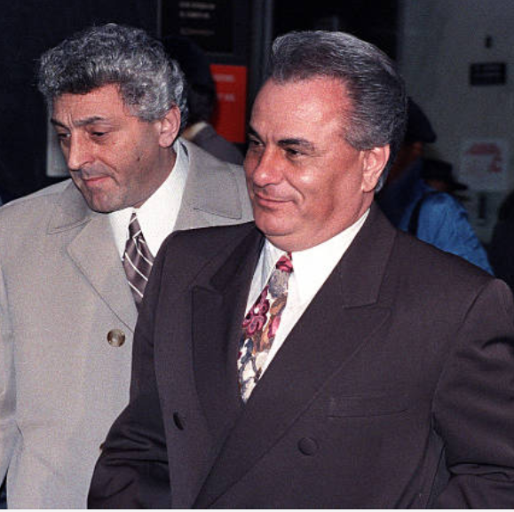  Jackie D’Amico (l) accompanies John Gotti during the Gambino boss’ racketeering trial via Daily News, Jan. 8, 1990 