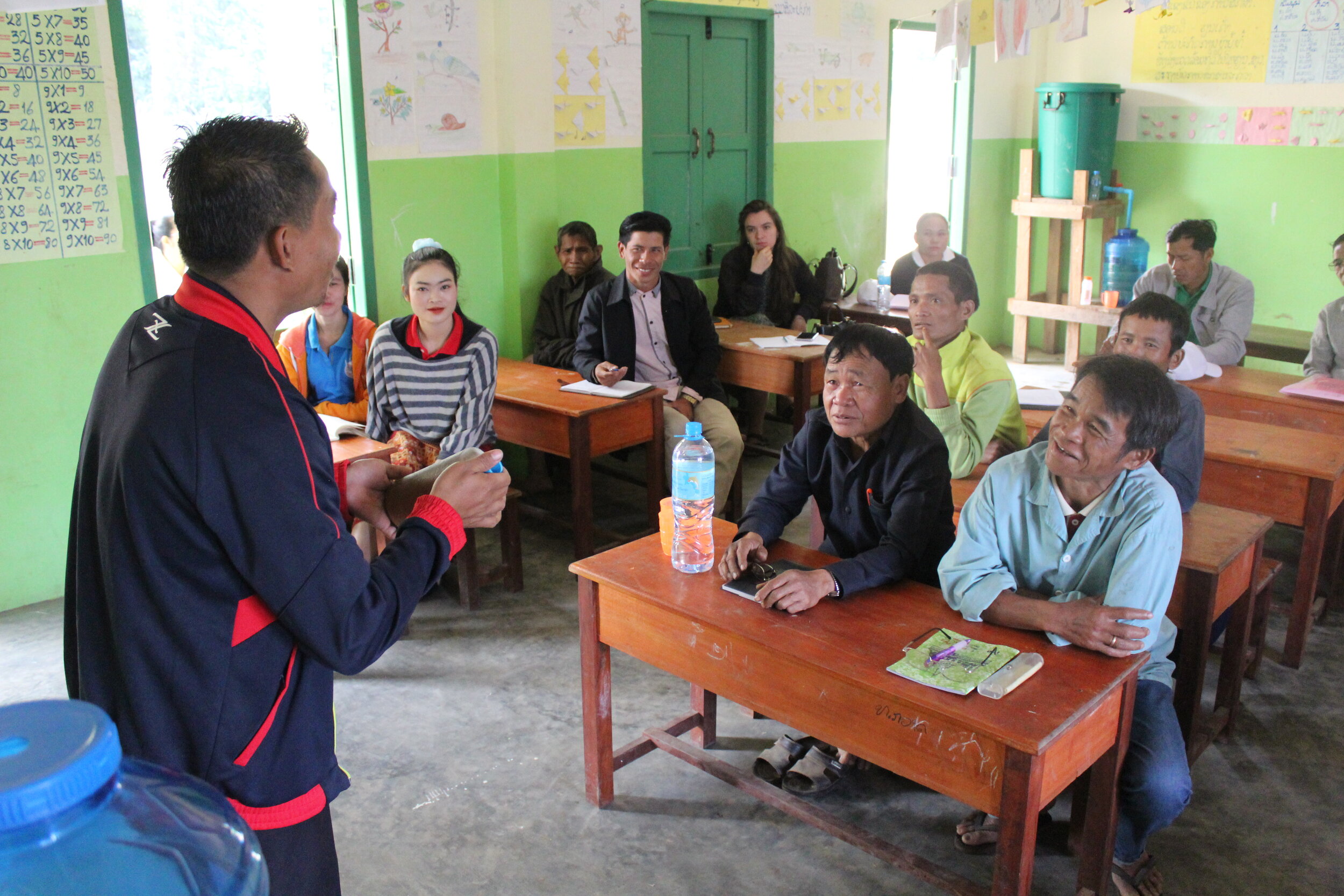  Vendor teams introducing ceramic water filters to the school staff in Halong village 