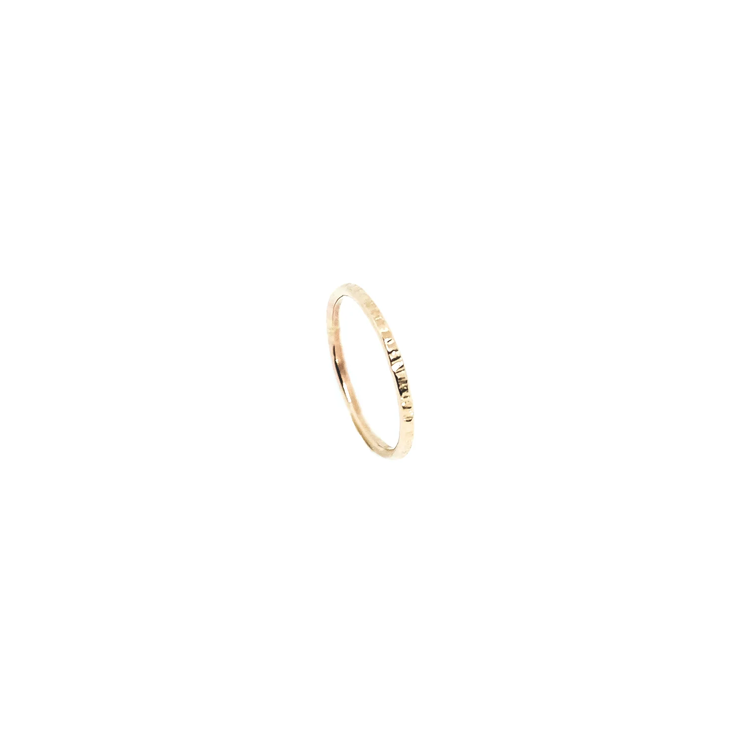 thin delicate wedding band with hammer textured
