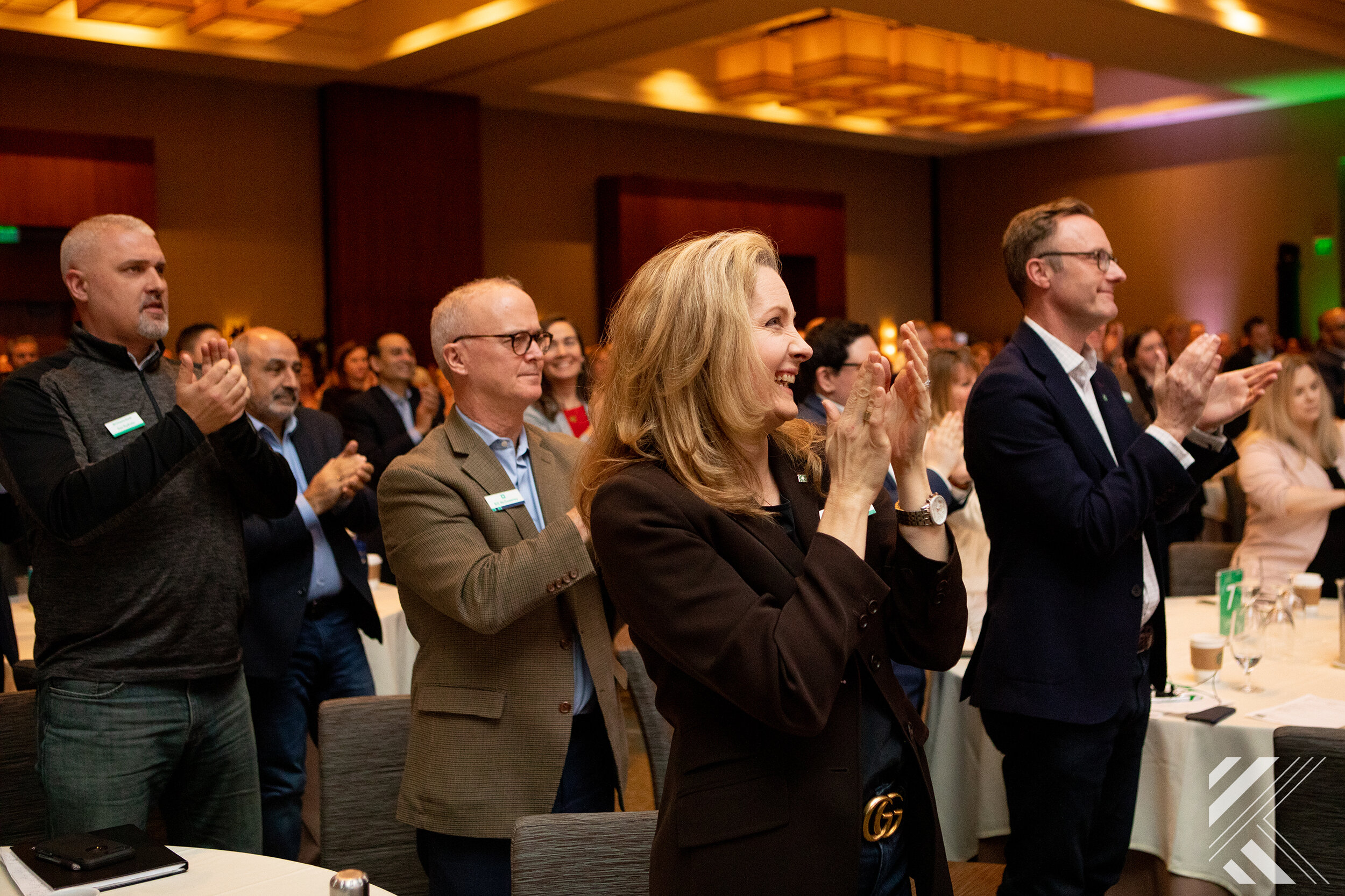 Audience applause during conference