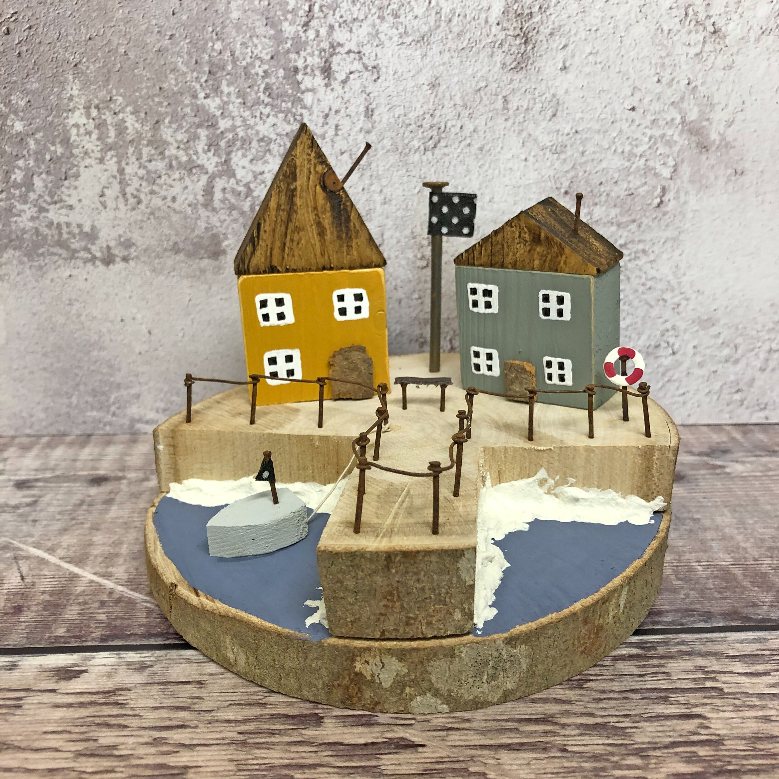 "Watching the boats come in" Wooden House scene