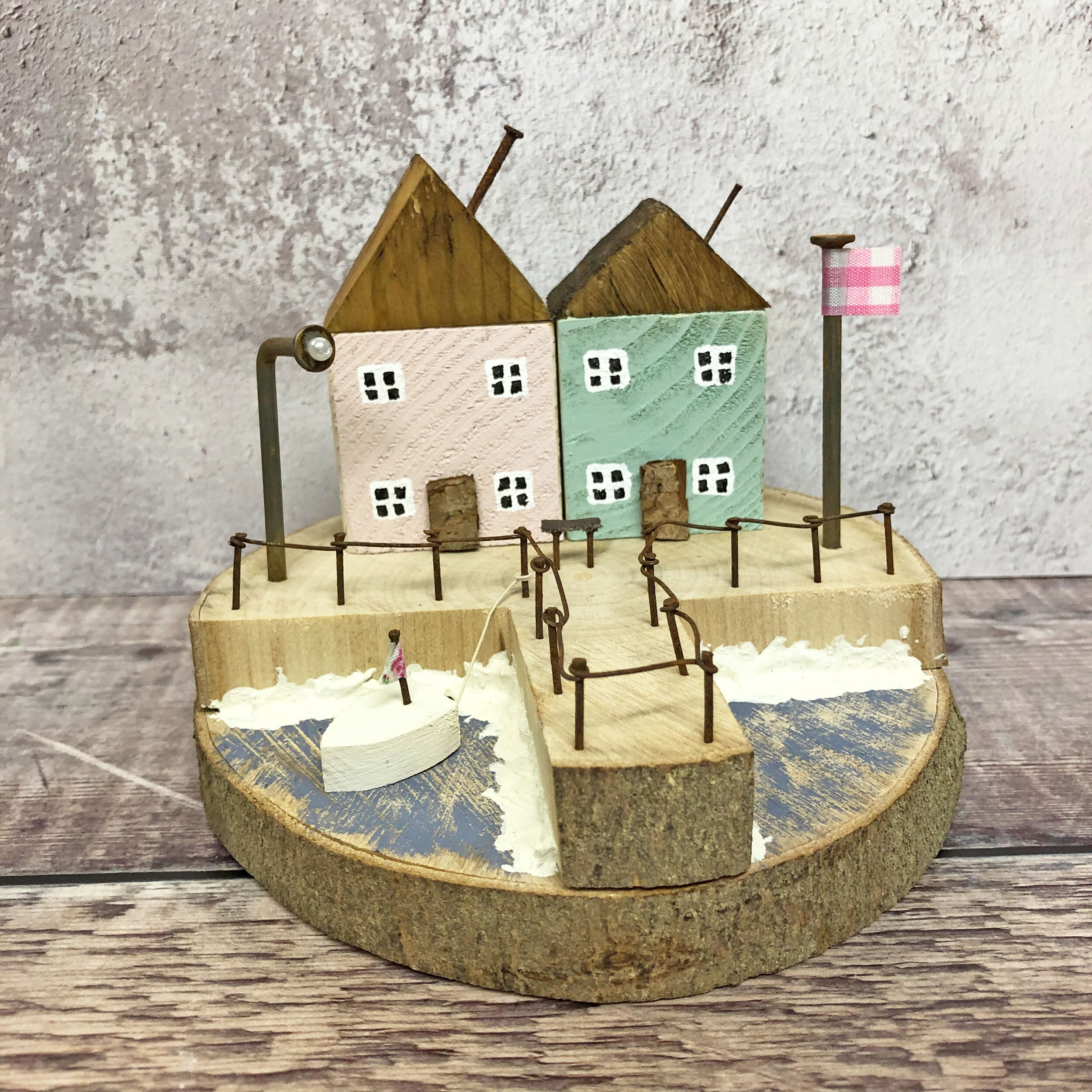 "Down at the Pier"  wooden houses 