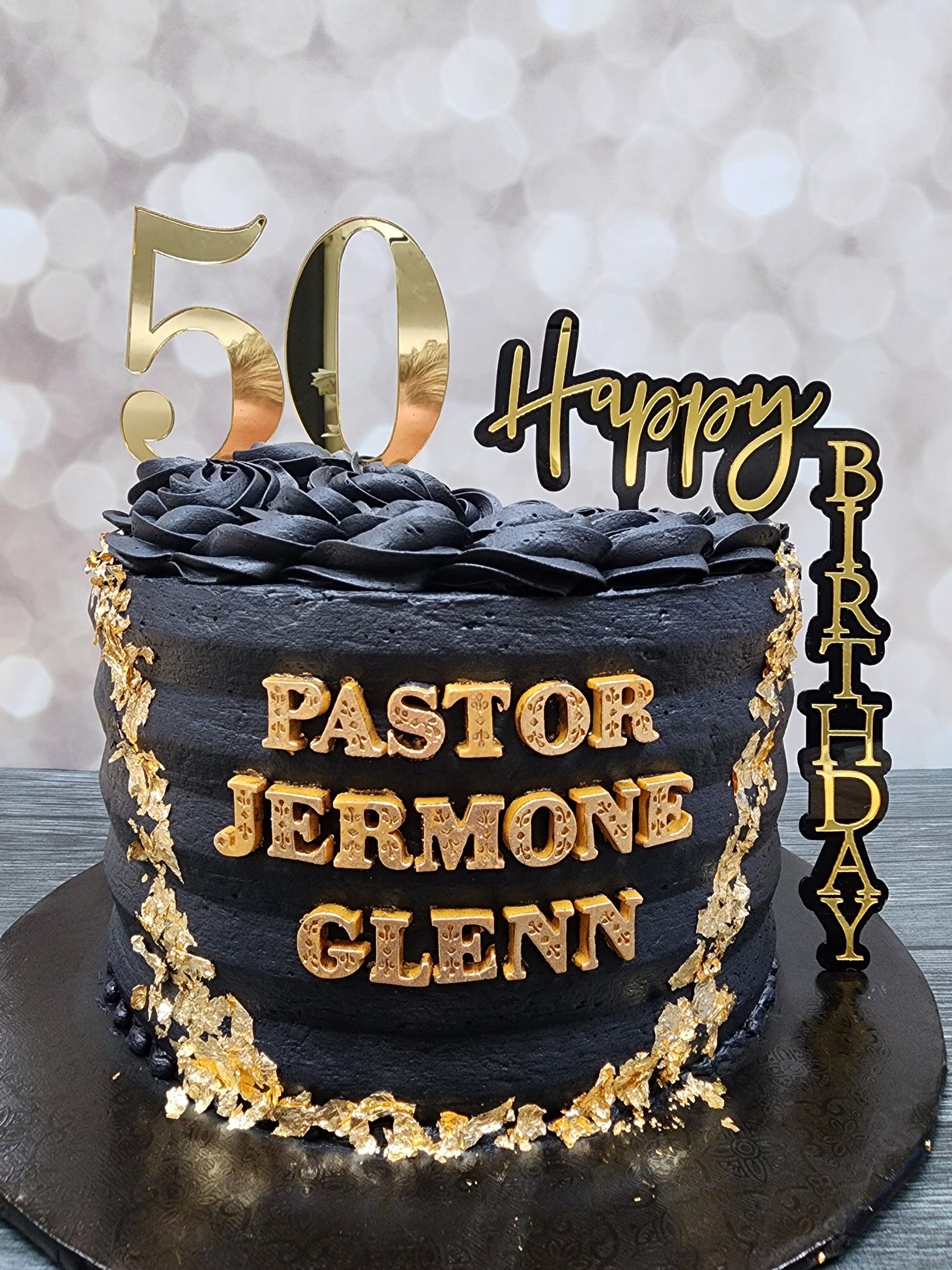 black and gold male cake.jpg