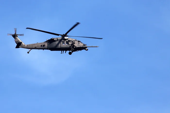A UH-60 Black Hawk patrols the KSC airspace minutes before the launch.