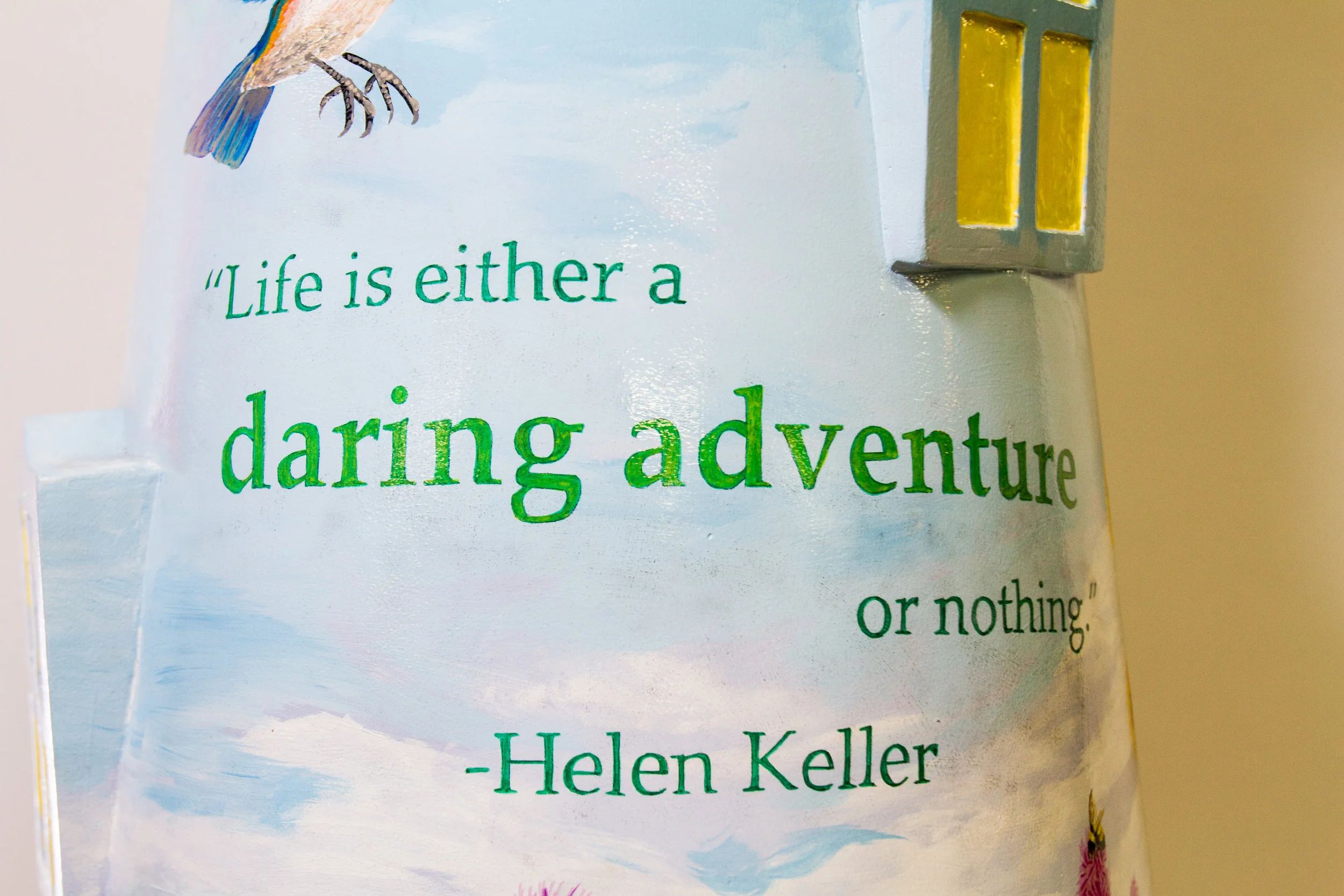 Helen Keller embraced life to the fullest. She traveled throughout the world and was active in many communities. This quote is painted on another lighthouse sculpture as part of Lighthouses on The Mag Mile celebrating access and inclusion for people with disabilities. This lighthouse is by artist Carrie Carlson. 