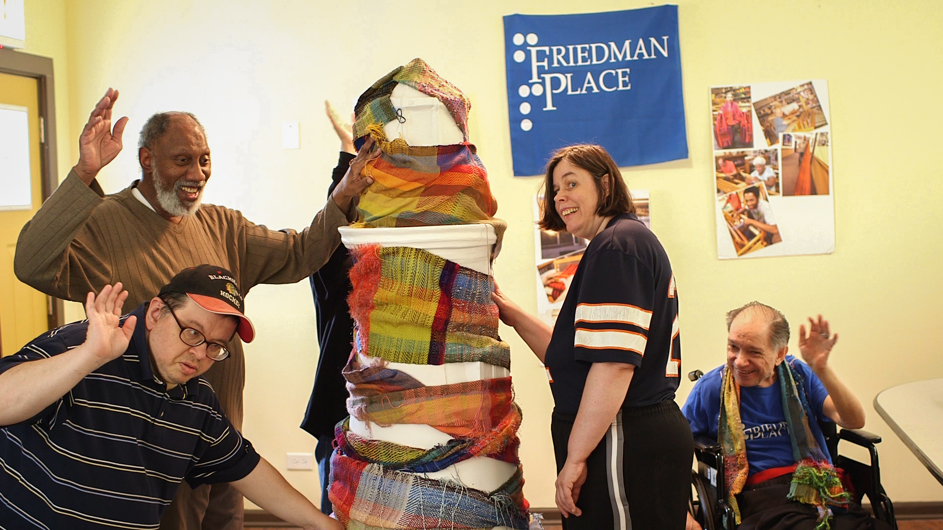 Twelve artists with The Blind Weavers of Friedman Place worked together to create the sculpture titled Our Woven Lighthouse that is currently on display as part of Lighthouses on The Mag Mile, a public art display celebrating access and inclusion for people with disabilities. 