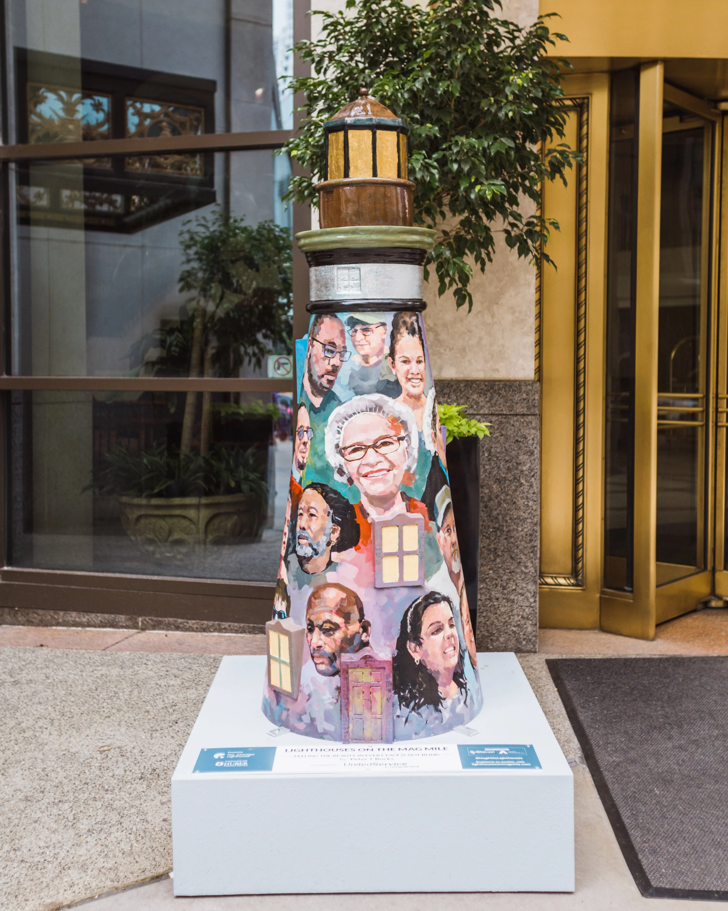 This lighthouse titled "Feeling the Beauty in Every Face is not Blind" by Peter J. Bucks features portraits of many employees of The Chicago Lighthouse who are blind or visually impaired. 
