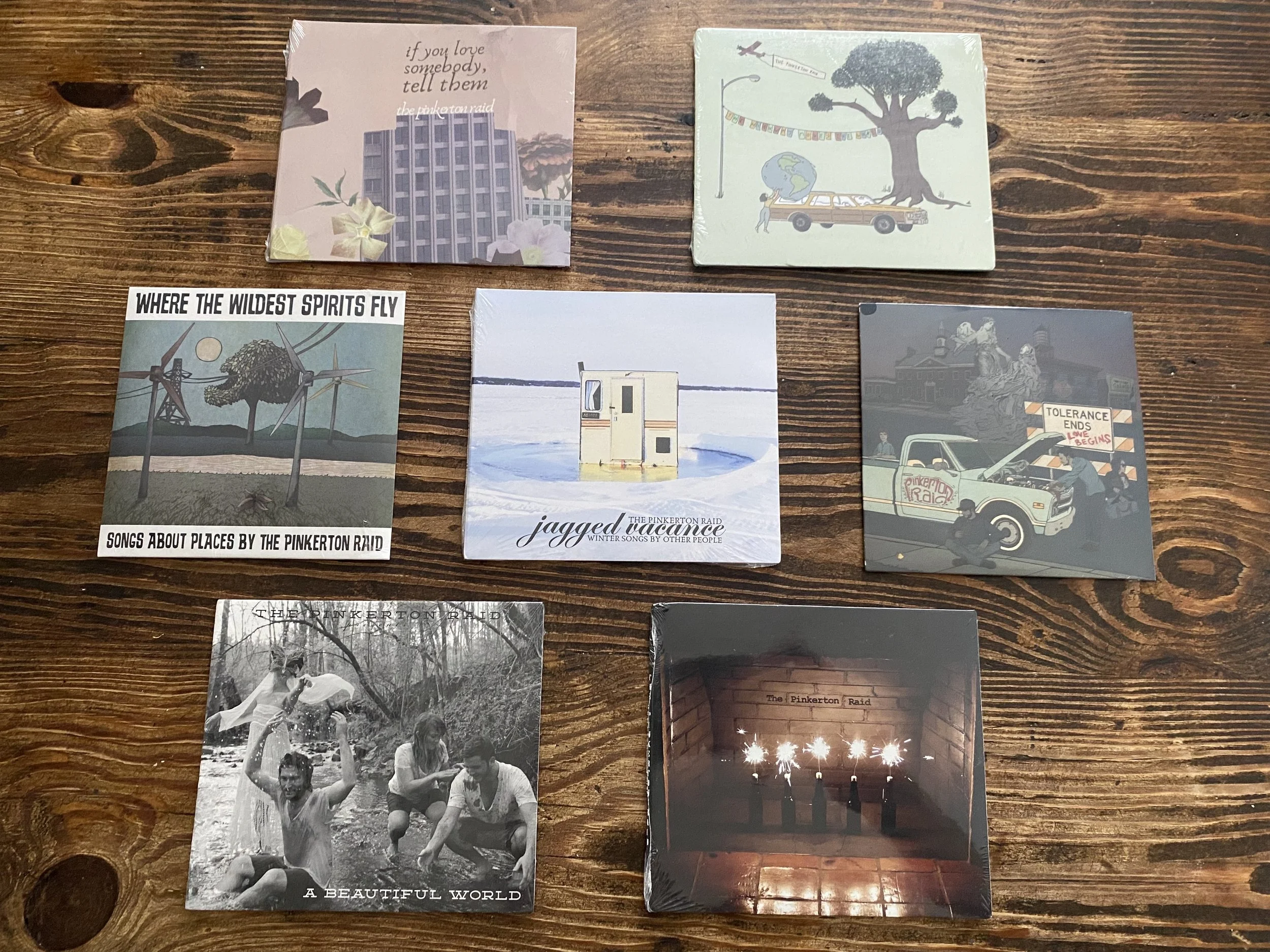 7CDsMerchPage.jpg