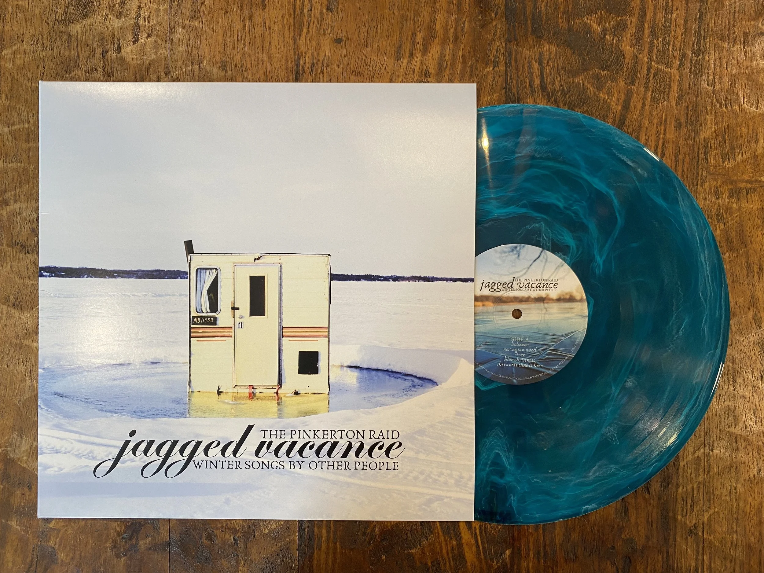JaggedVacanceVinylMerchPage.jpg
