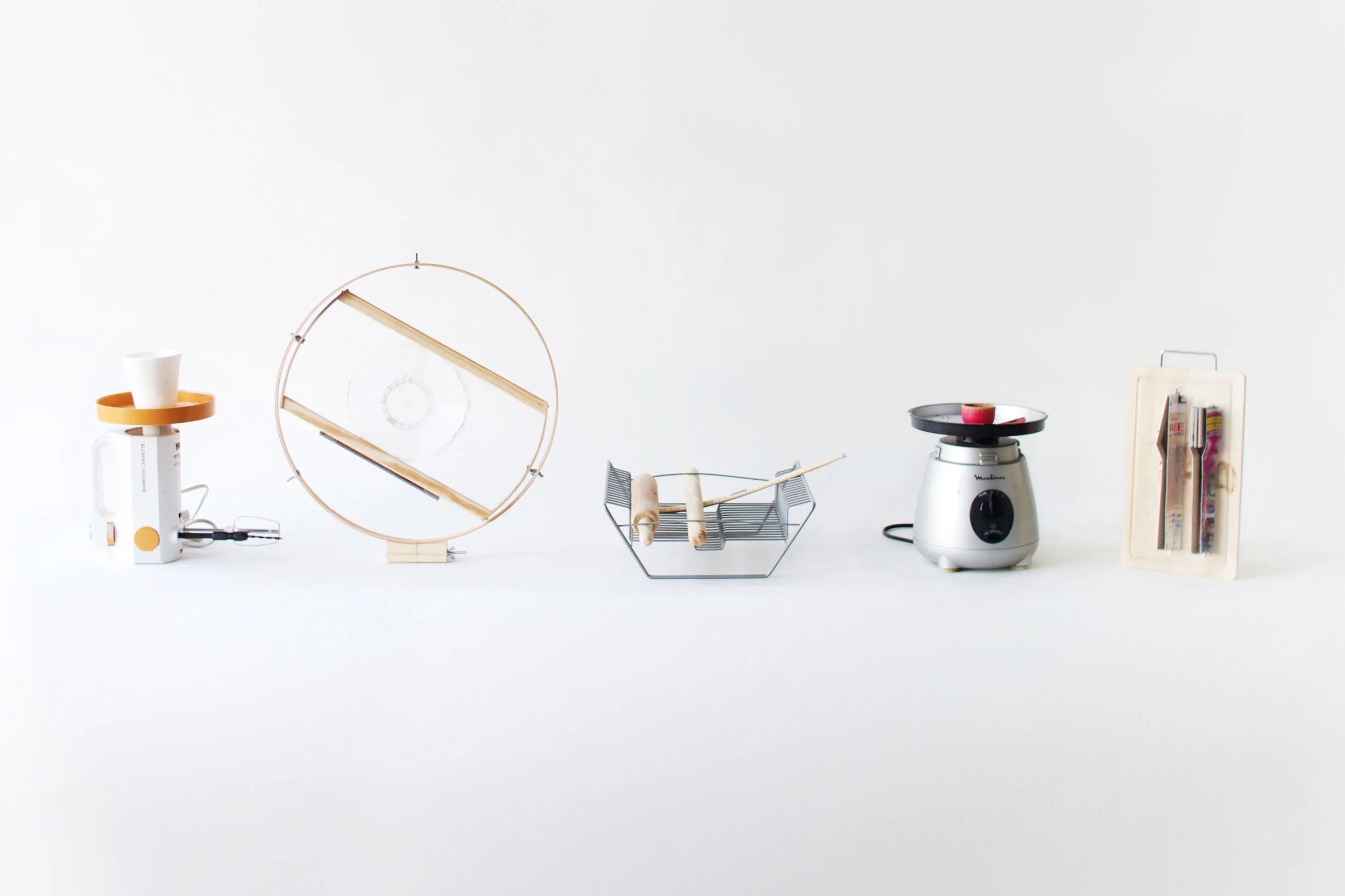 Tools: (from left) Mixer pottery wheel, rotocasting device for washing machine, ruler bending jig, blender lathe, cutlery moulds