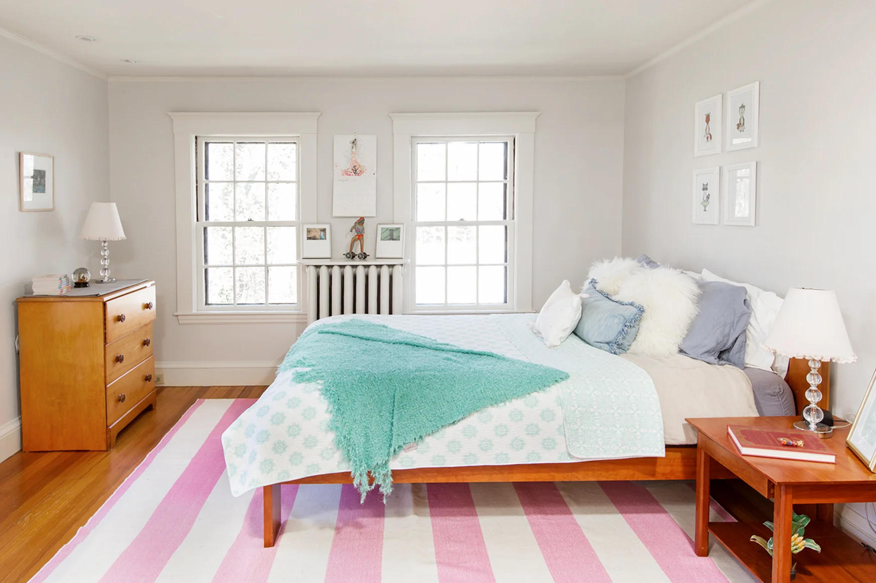 This is one of my favorite bedrooms. the homeowners were using it as the master, but it was not right to show it that way for buyers. While a few items were removed, the main furniture belonged to the homeowner. Accessories, floor covering and some additional bedding were added. The entire room was repainted which created a beautiful blank canvas allowing the room to remain simple and elegant.