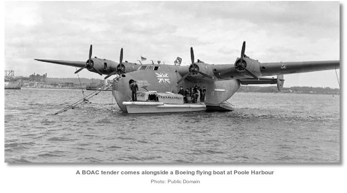 a_boac_tender_comes_alongside_a_boeing_flying_boat_at_poole_harbour.jpg