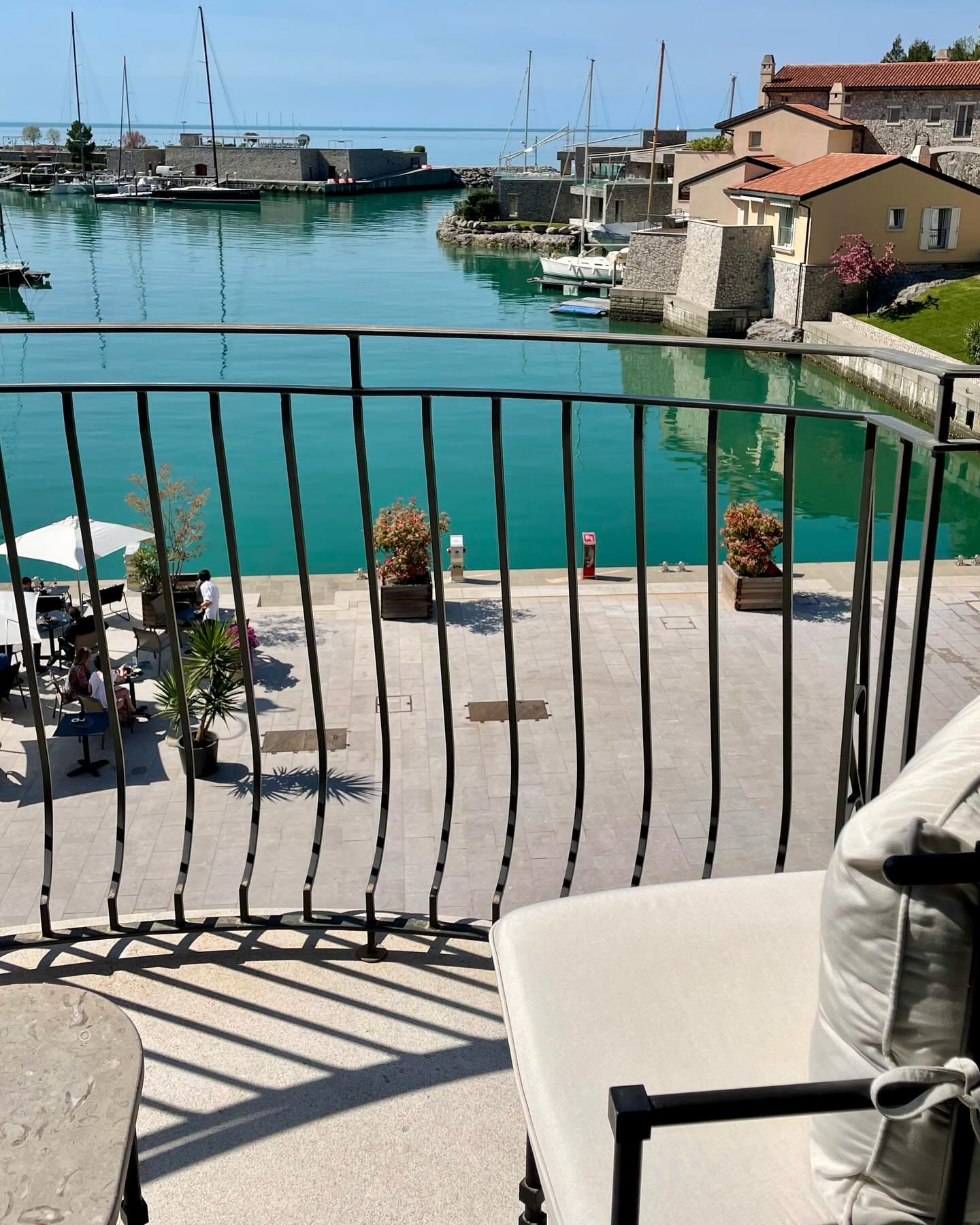 What a treat to open my balcony doors to this peaceful view upon arrival at the chic Portopiccolo Sistiana Resort &amp; Spa near Trieste! 🙌🏼☀️⛵️Following a fizzy 10 days of travel and events, on both the Amalfi Coast and in Venice, the glassy blue 