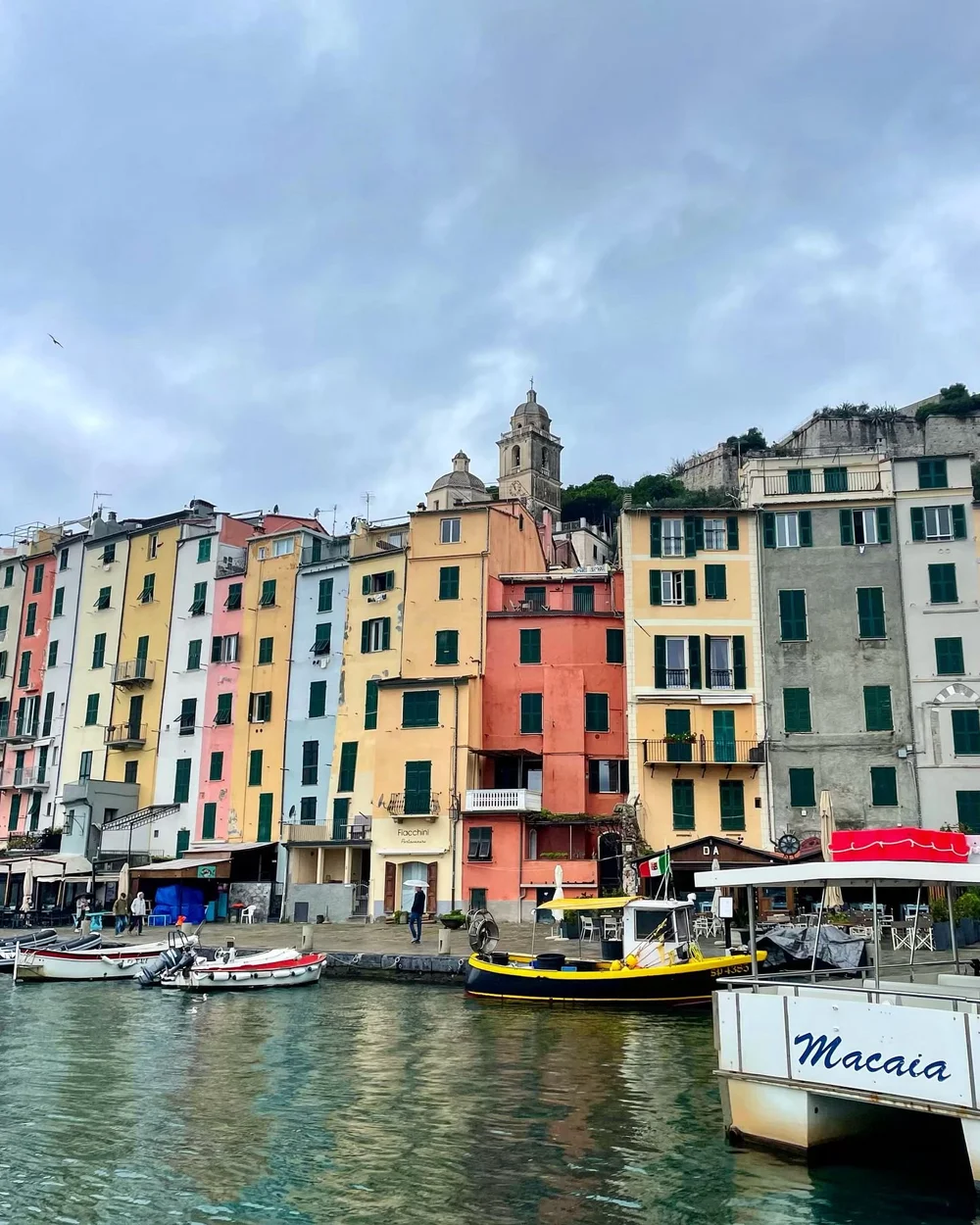 Picturesque Portovenere, Italy. 🇮🇹 When a cloudy day turns into a downpour: find a colorful trattoria like ANTICA
OSTERI&bull;CARUGIO, dine on rustic pasta, sip the local vino and top with gelato. Even a rainy day can feel colorful in Italia! ☔️ #p