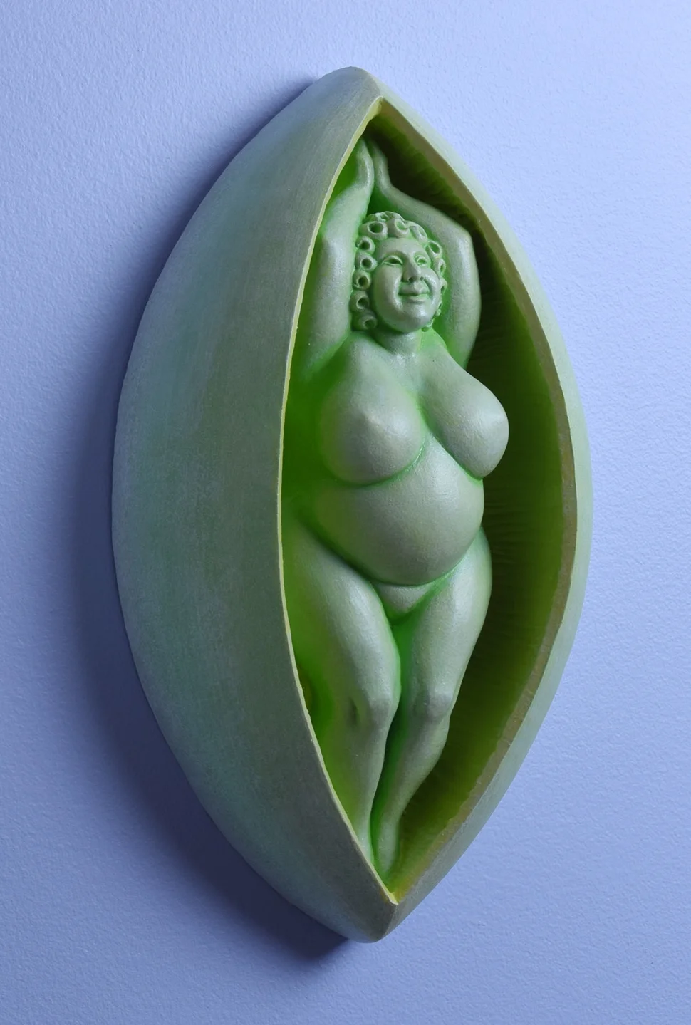 Though she’s sometimes called the “Pea-pod Lady” to avoid offending delicate sensibilities, the shape of her shell is the reference you think it is.