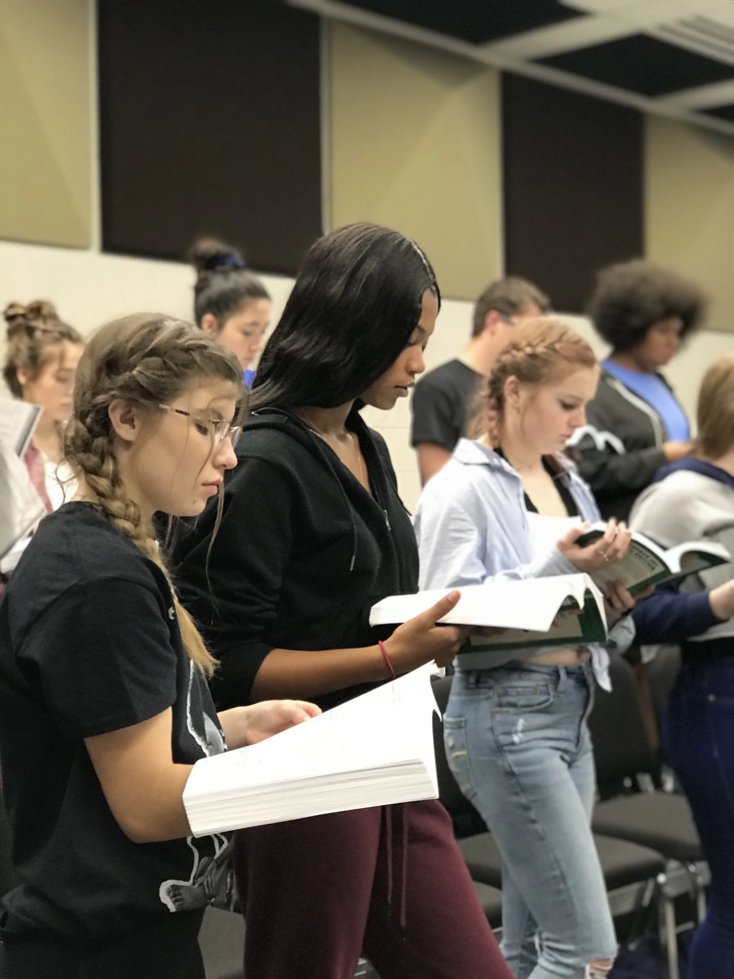 TAA students rehearse vocal music with Mr. Mead