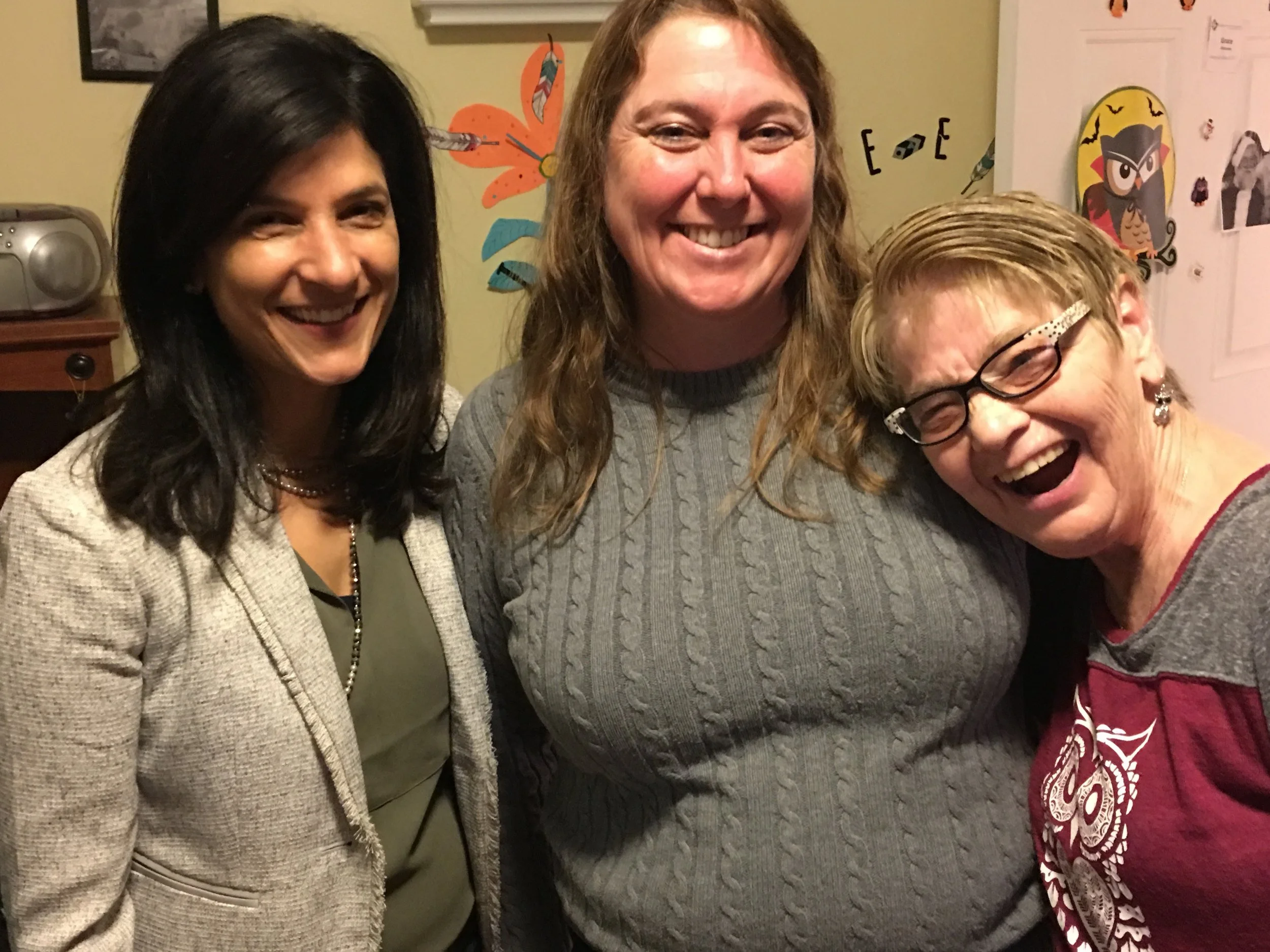 House Speaker Sara Gideon, left, with Amy Davis, associate director of residential services, and a resident of Independence House .