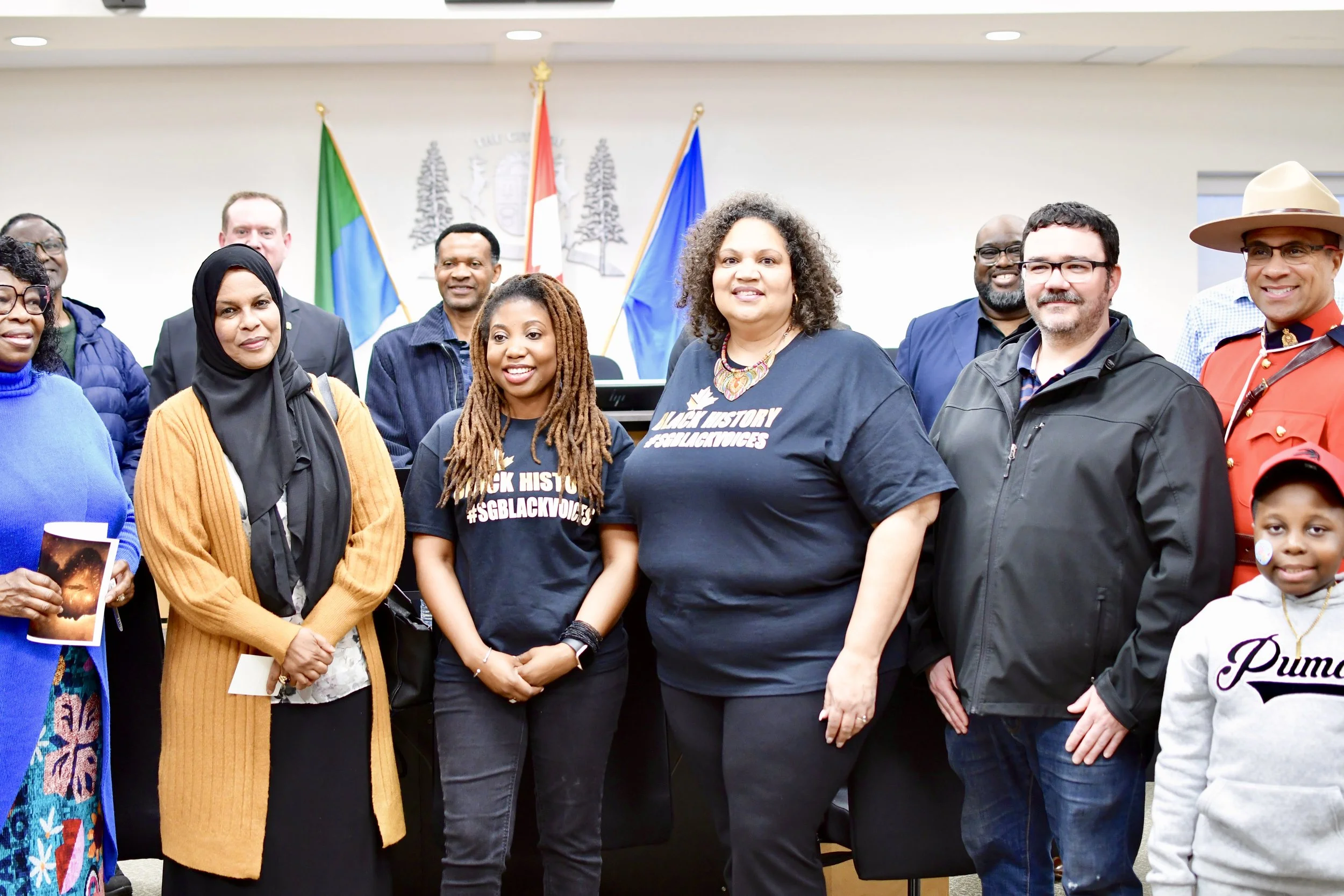  Community members and leaders celebrating Black heritage at Spruce Grove’s first Black History Month proclamation.  