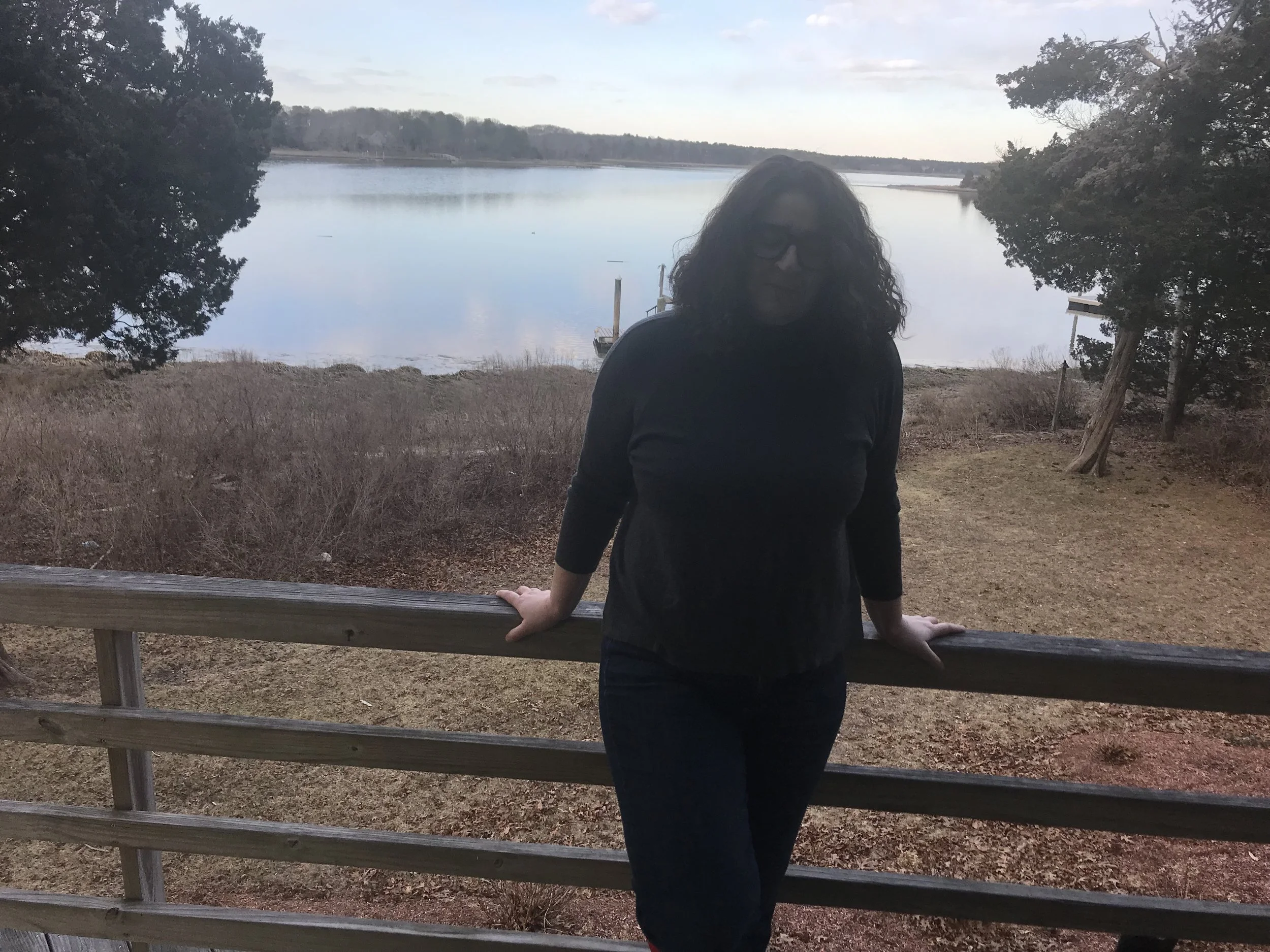 This photo were taken with a phone against brightly lit background. You can’t see whether the model’s eyes are open. The horizon is not even, the model is “holding” the horizon with her head. The model’s legs are cut randomly.
