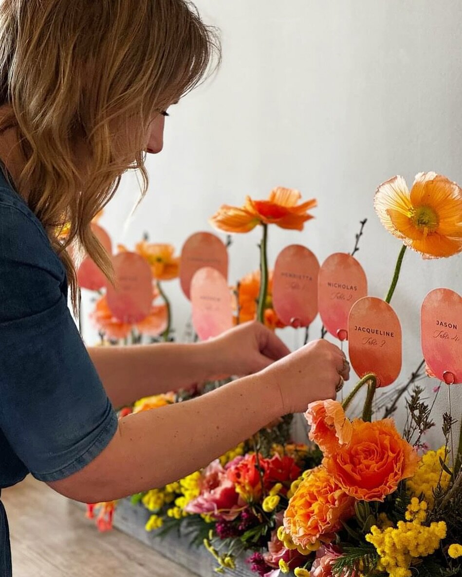 Escort cards 🔖 

I loved working on this concept for an escort card display, your guests names nestled amongst beautiful blooms. Such an enchanting and fun way to find their seats. 

@jessicaelizaflowers stunning arrangements, in her new bespoke tro