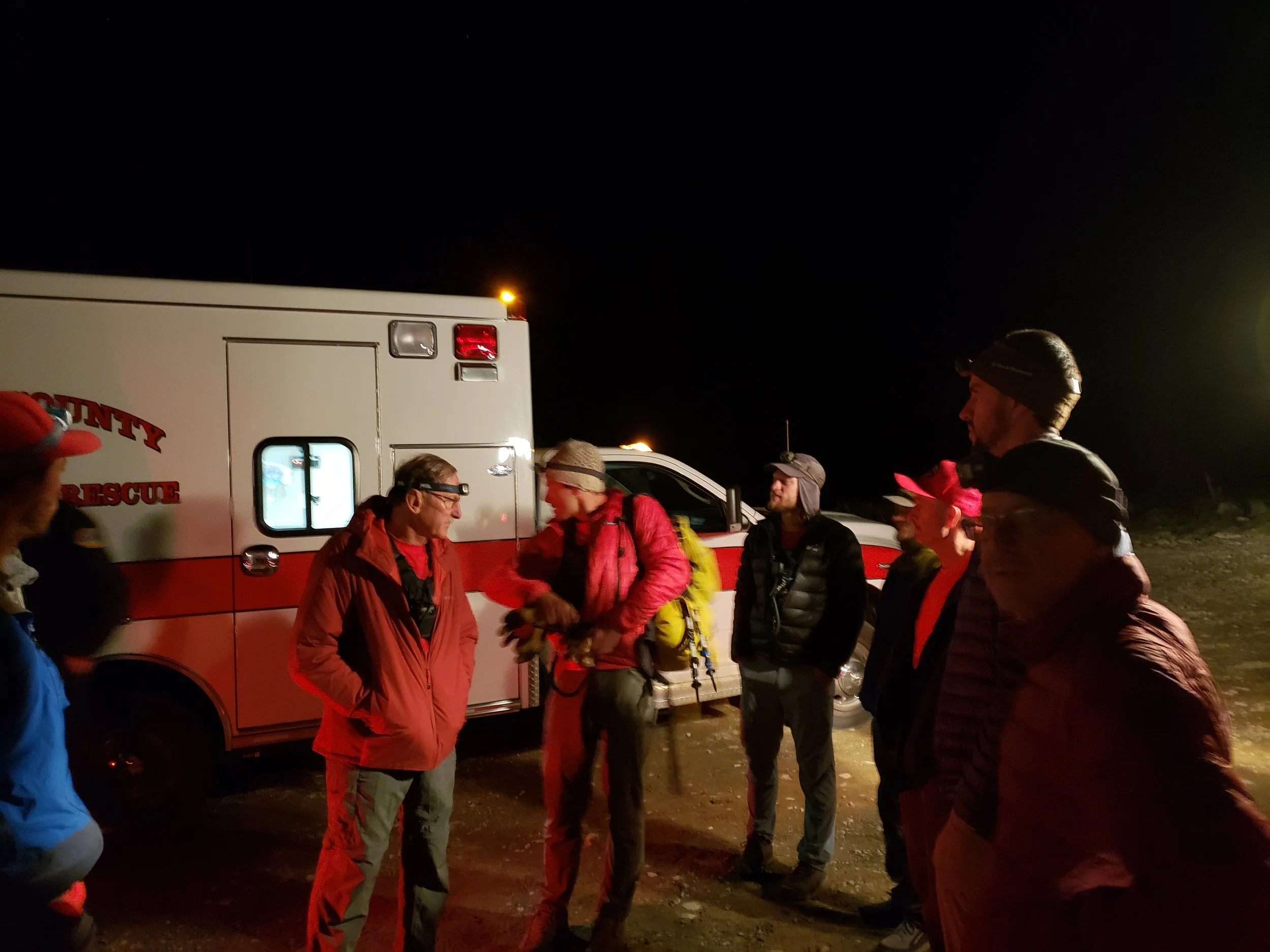 Team debrief after the medics accepted responsibility for our subject. Image by B. Beck