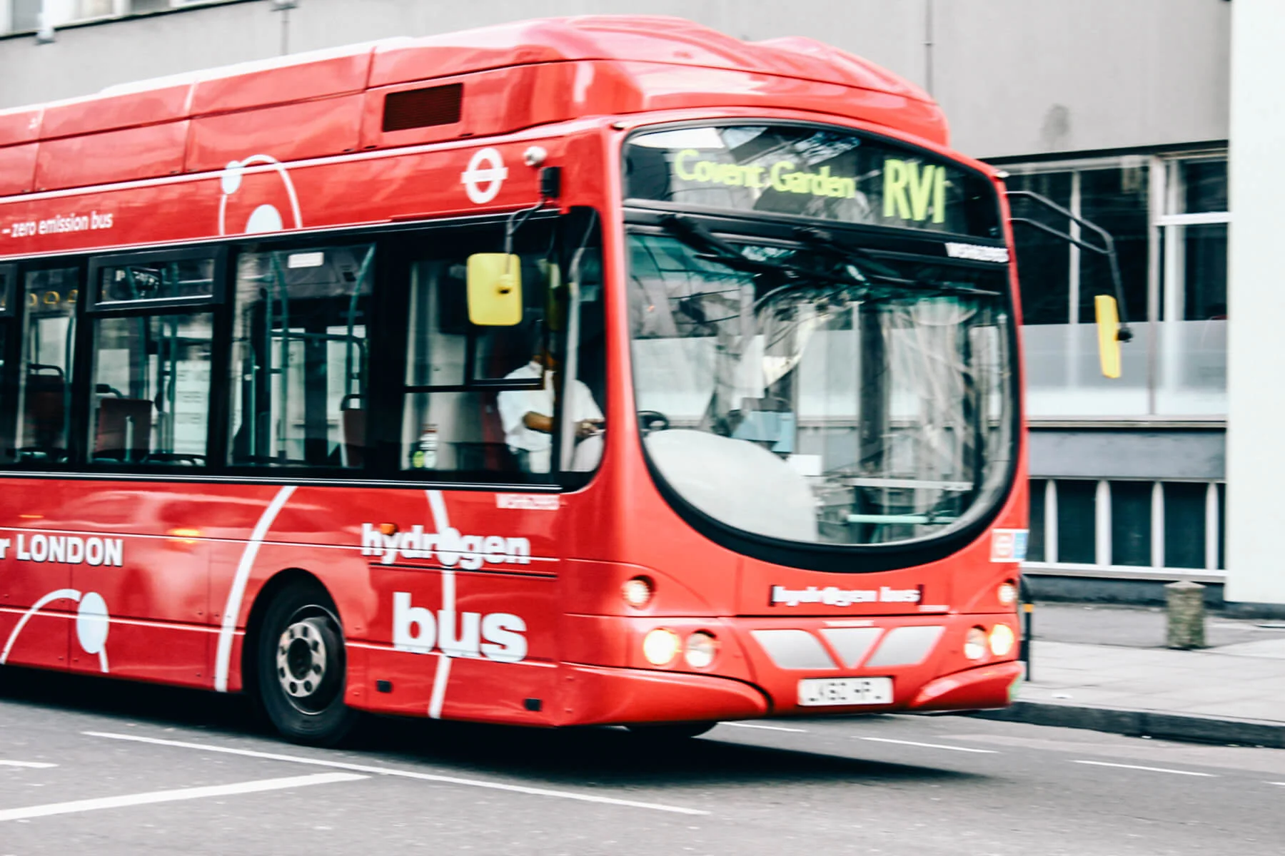 Boy stepping up steps on bus