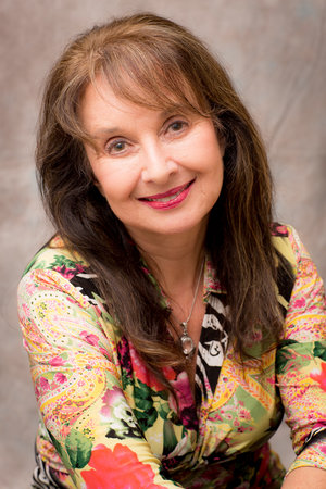 Jasmin El Kordi - Board member, committee chair, and emcee for The women's Center 