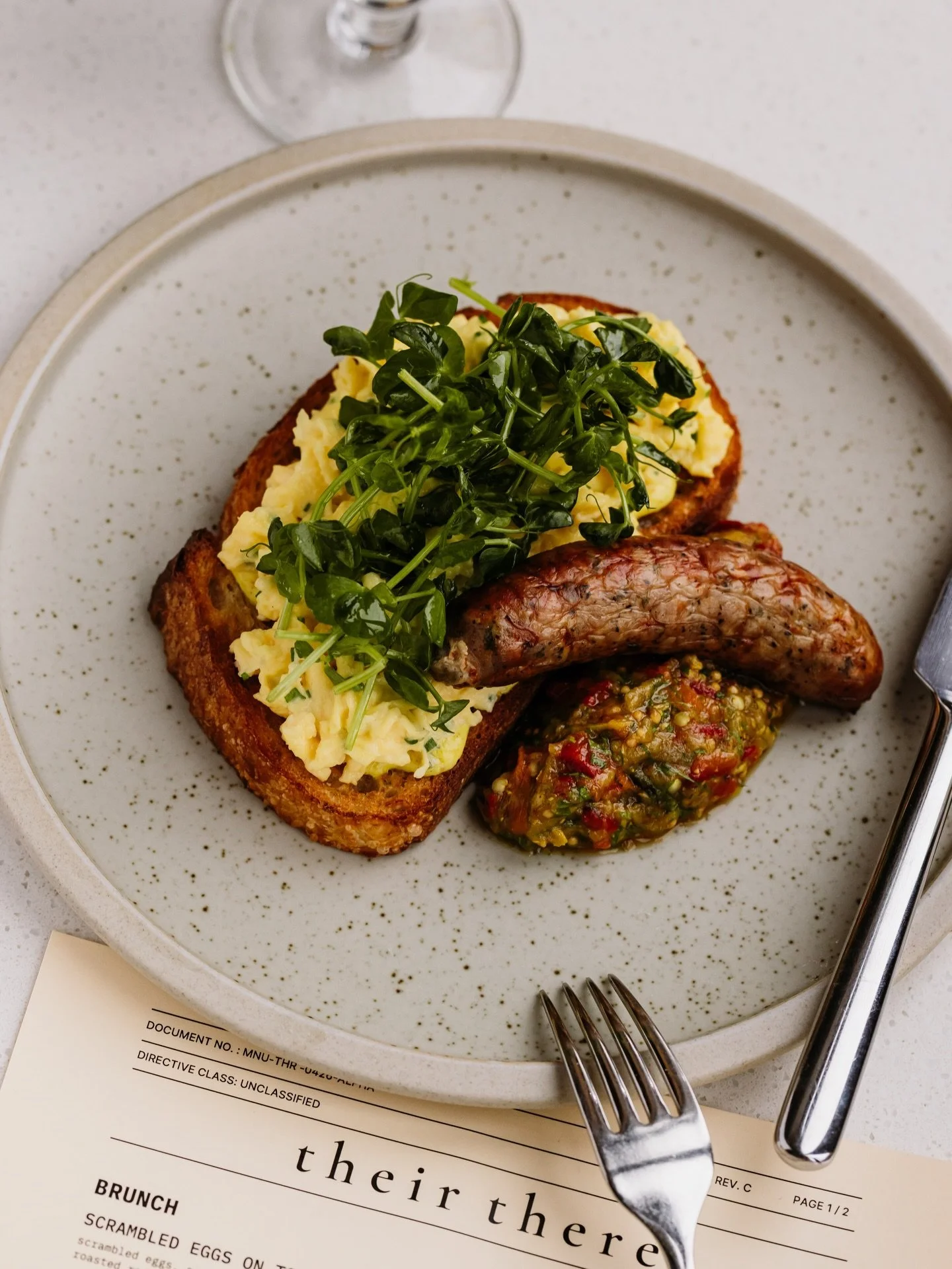 New Menu Item! Eggs on Toast 〰️ sourdough, vadouvan labneh, roasted red pepper &amp; eggplant, chorizo sausage #theirthere #brunch