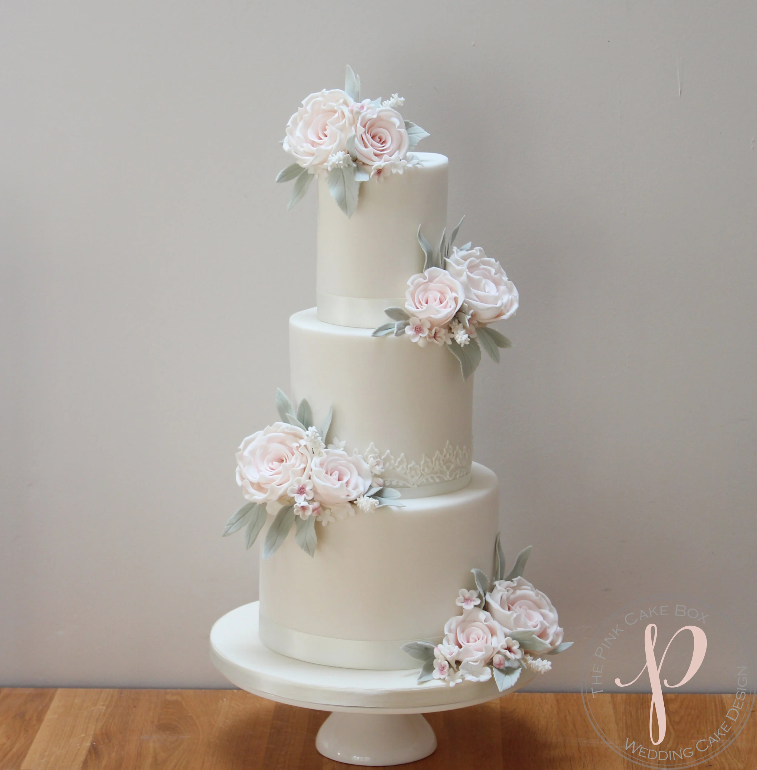 blush roses wedding cake hand piped lace.jpg