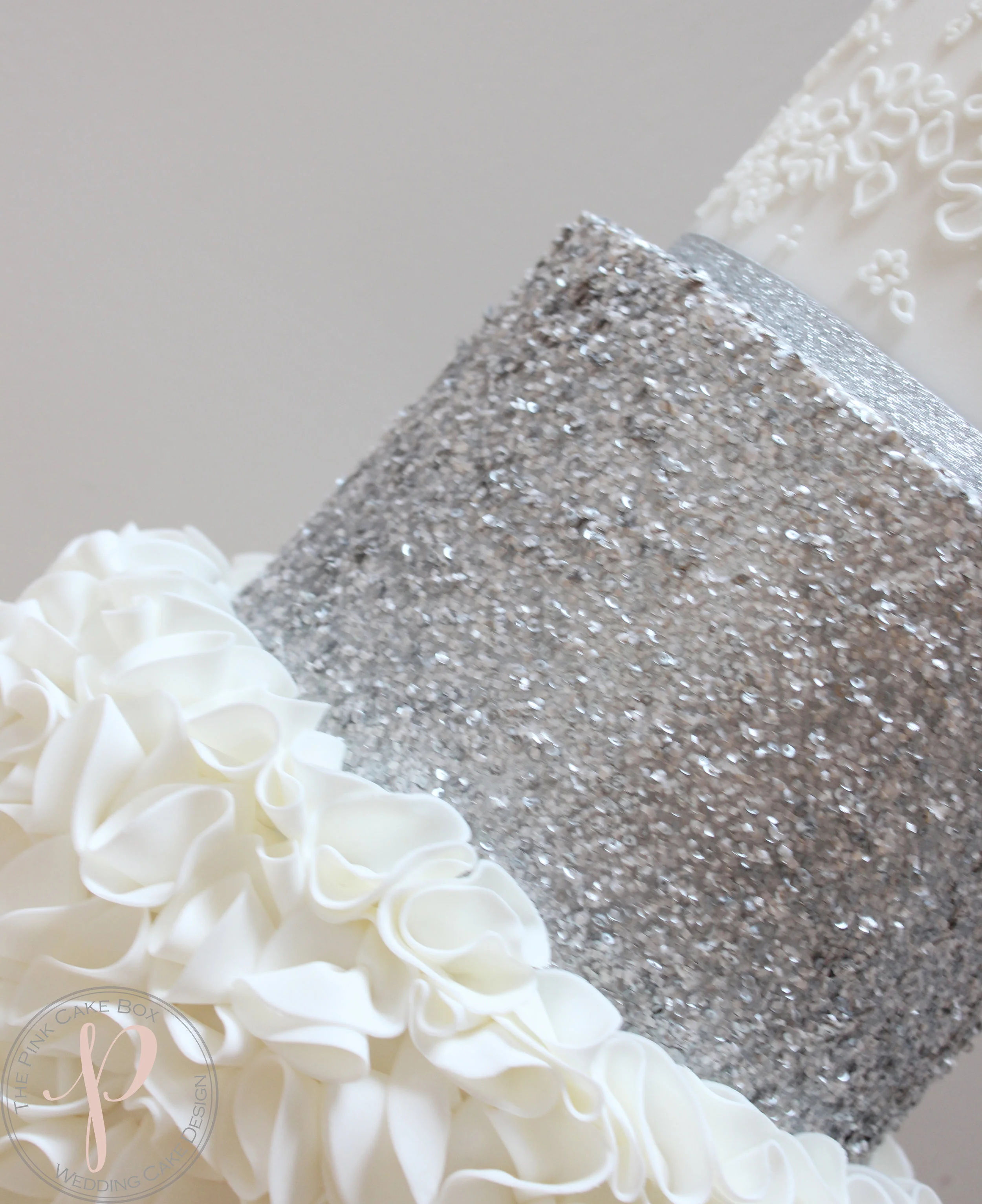 ruffles sequin and lace wedding cake.jpg