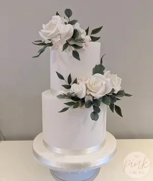Elegant 2 tier wedding cake with sugar flowers