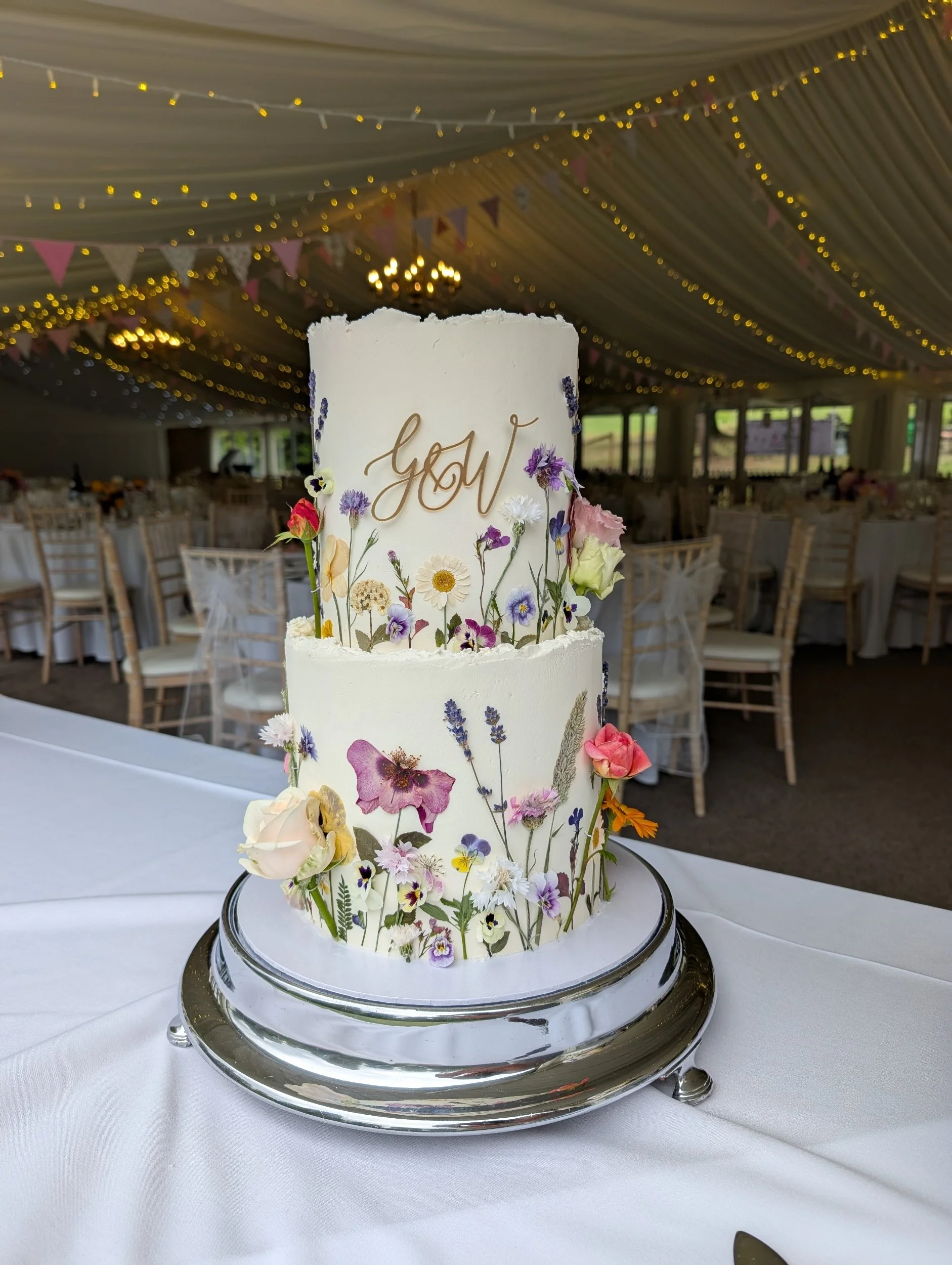 Pressed flower meadow 2 tier wedding cake