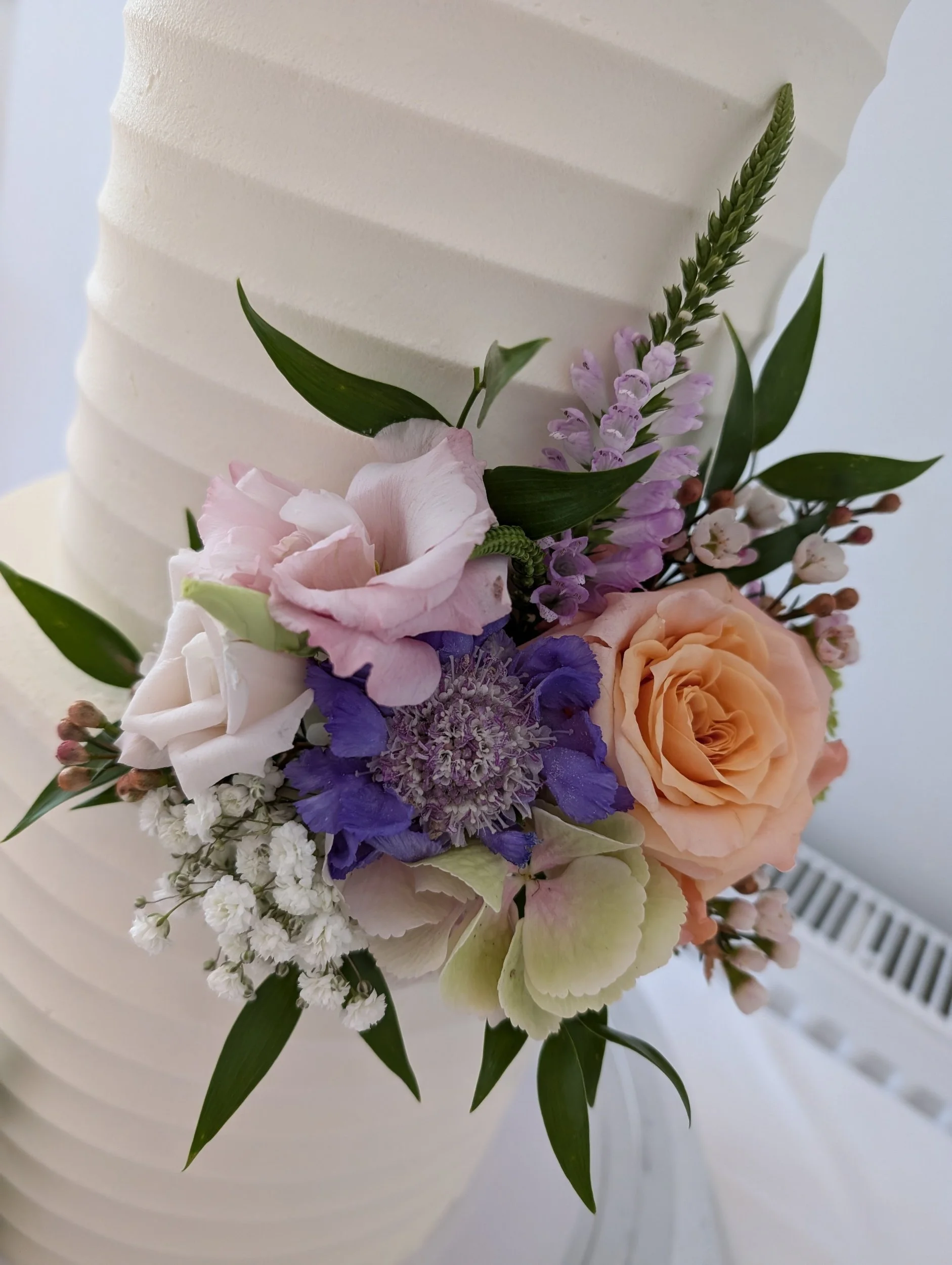 Buttercream wedding cake intimate wedding