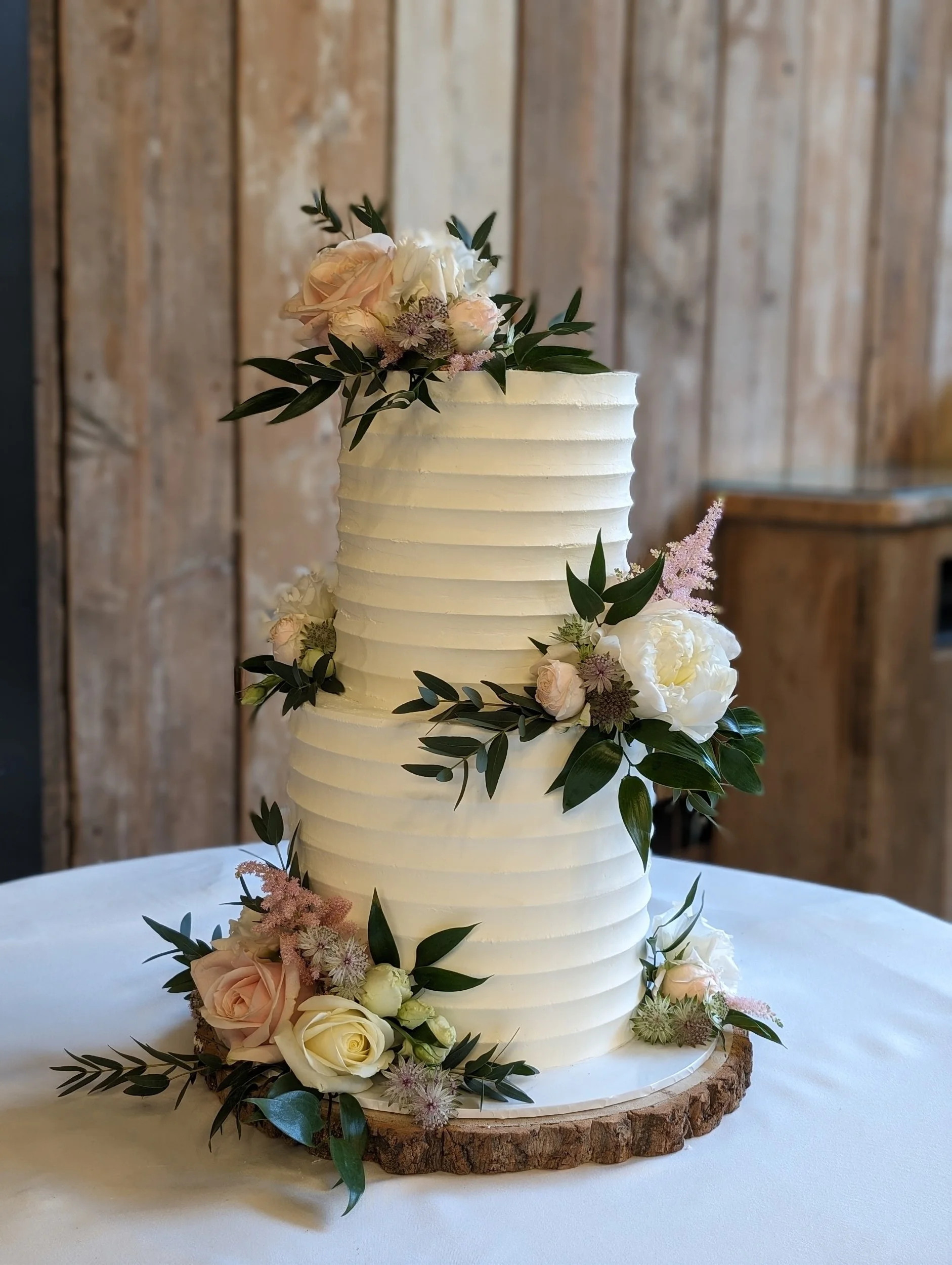 Buttercream wedding cake intimate wedding