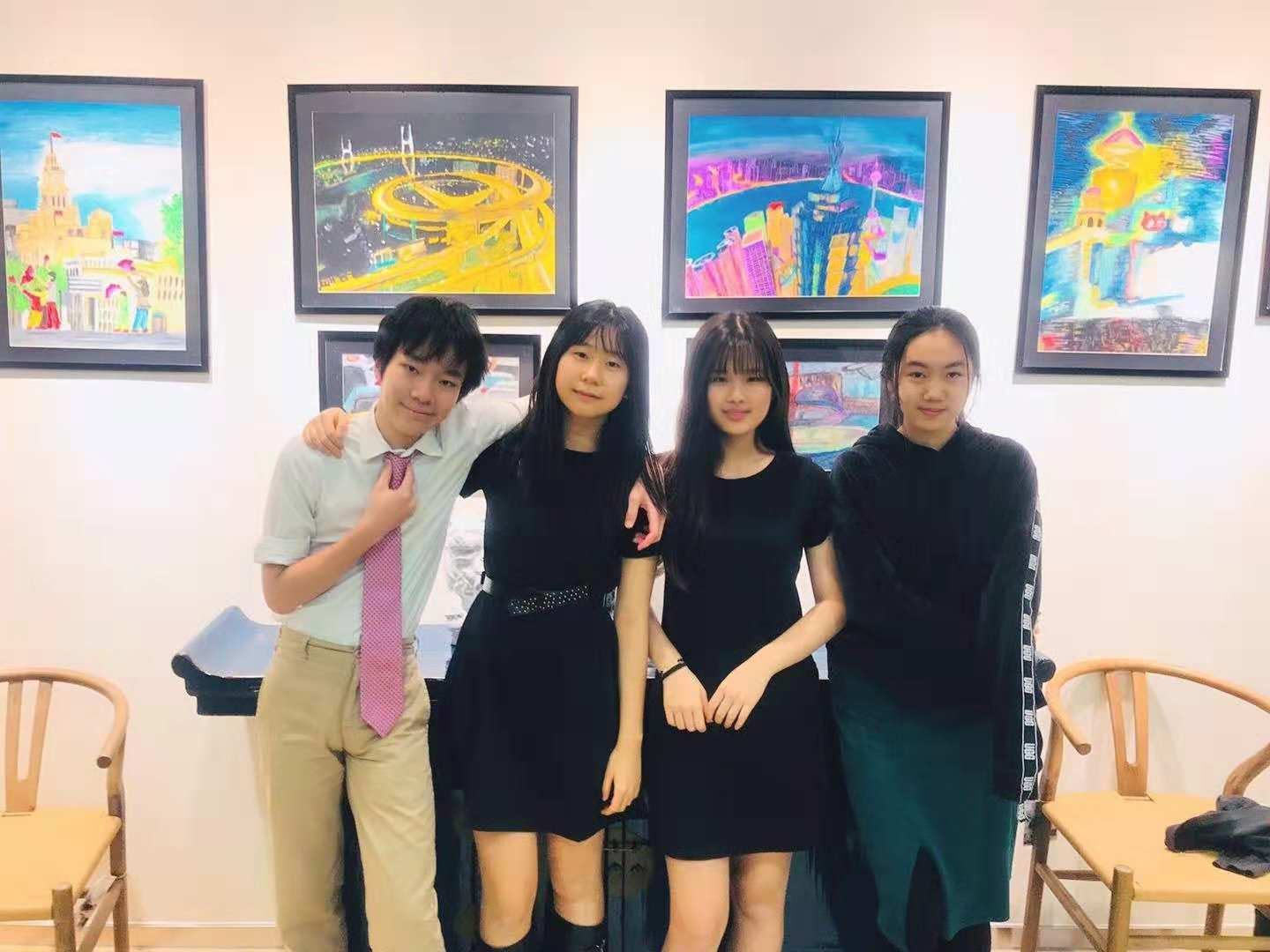 HS GIN Dressember members sporting dresses and ties on campus in early December. These students are committed to raising awareness about human trafficking and modern-day slavery.