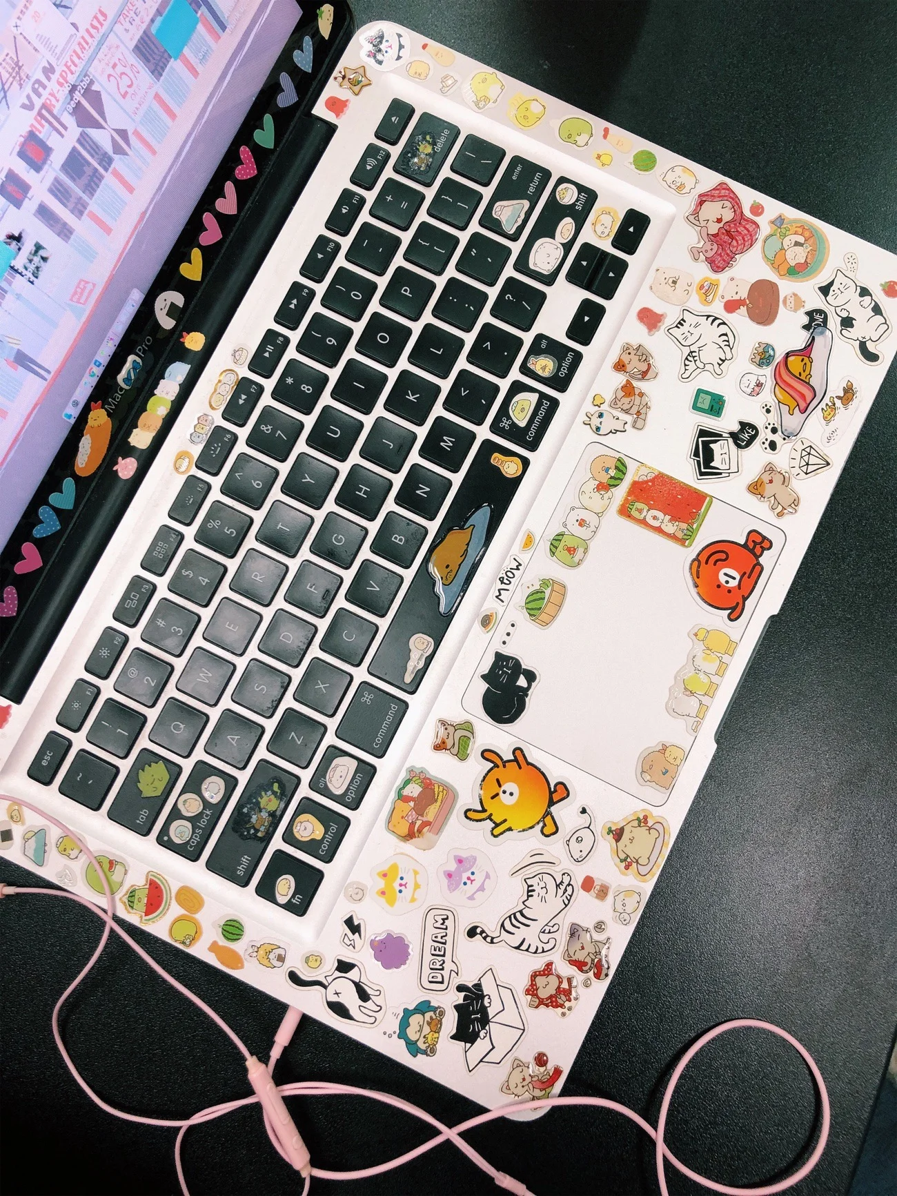 Is there a method to the madness, or are laptop stickers just random? (image: Hannah R., Concordia Applied Journalism )