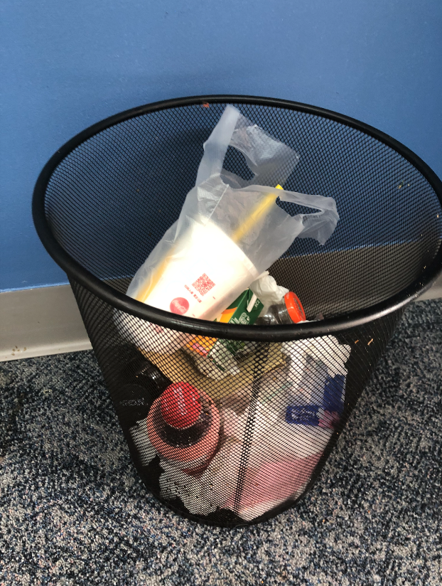 A typical bin of unsorted trash in the high school.