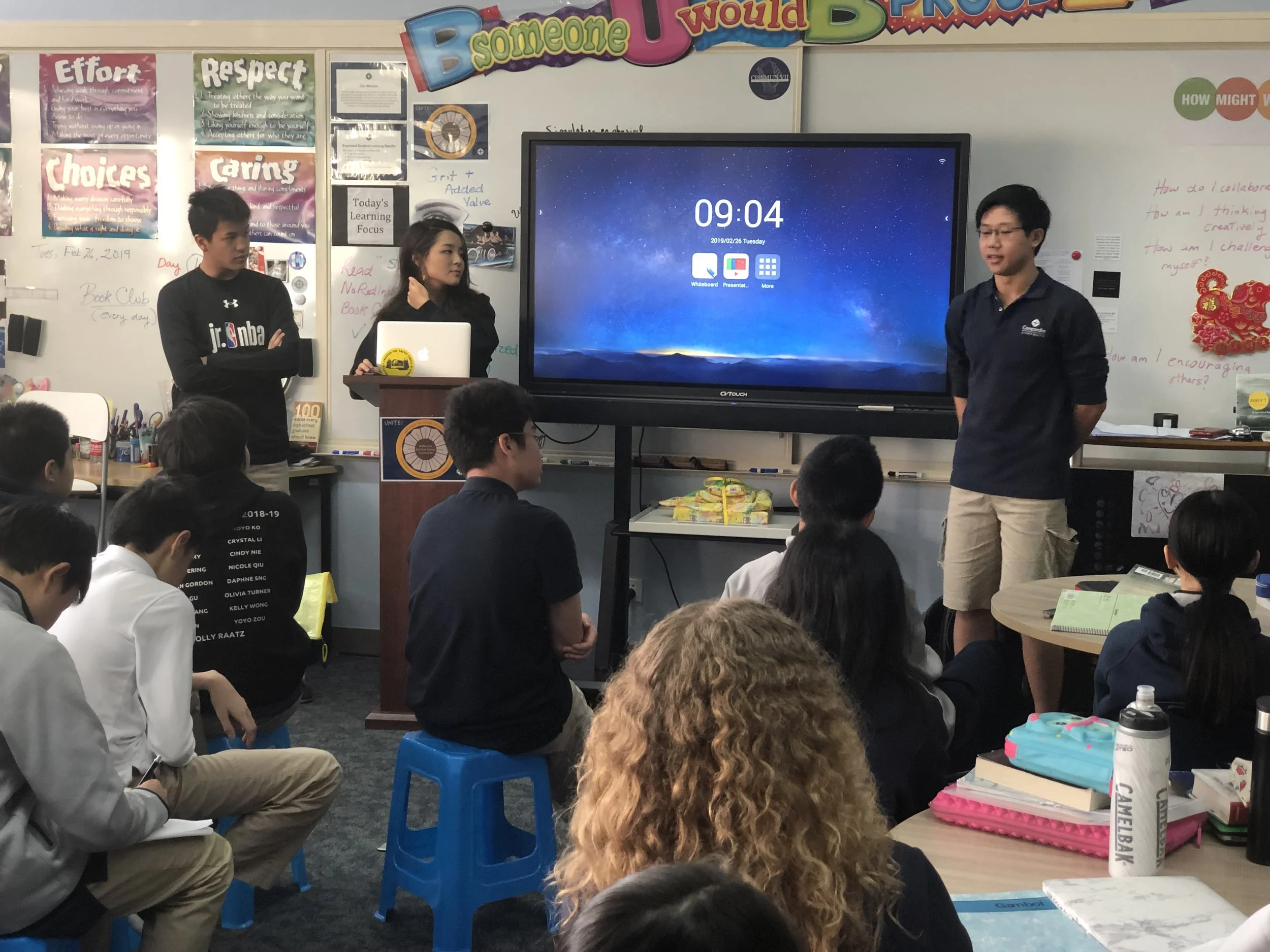 Applied Global Development Studies students presenting to younger students at Concordia.