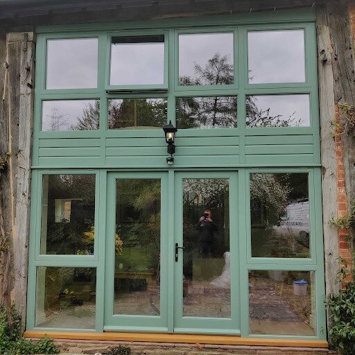 A beautiful custom-made front entrance frame built from Accoya, spray finished to our customer's desired colour and fitted near Ledbury.