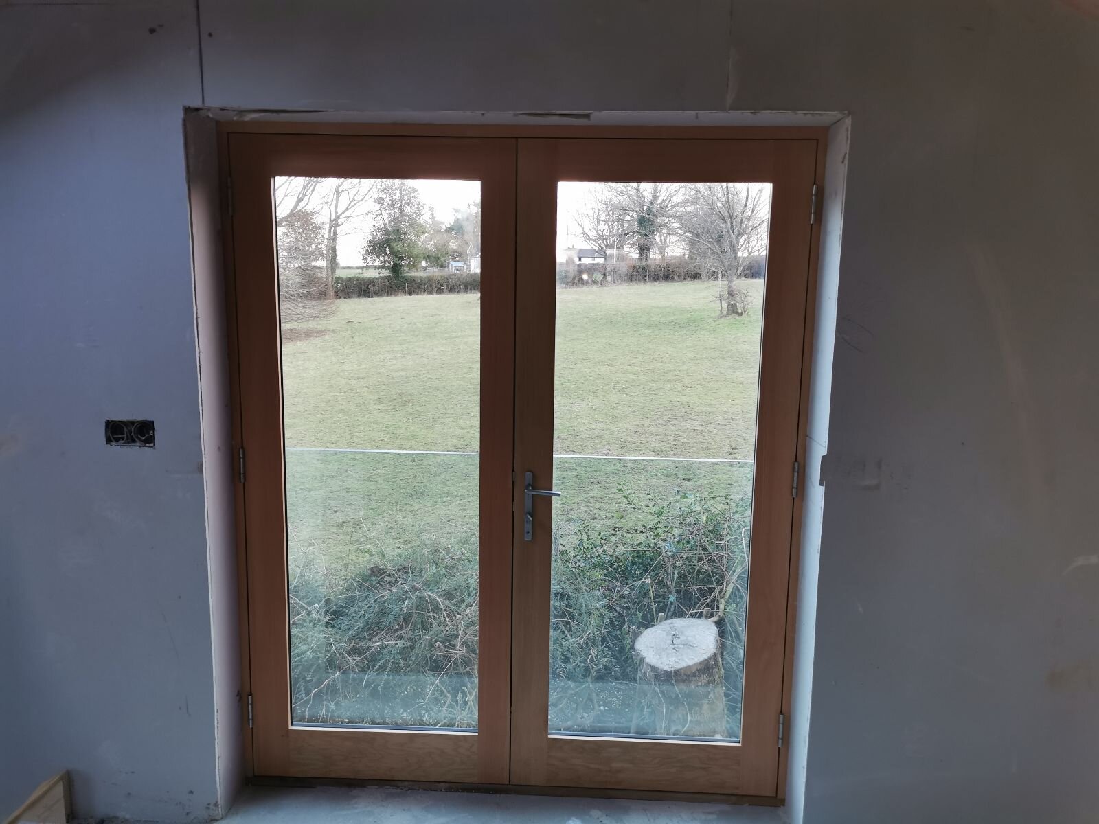 We fitted in south Herefordshire some Douglas fir windows and doors finished with Neptune-Cotswold external finish and clear fiddles oil internal. We also used solar glass on the south-facing French doors to ensure a comfortable temperature on hot su