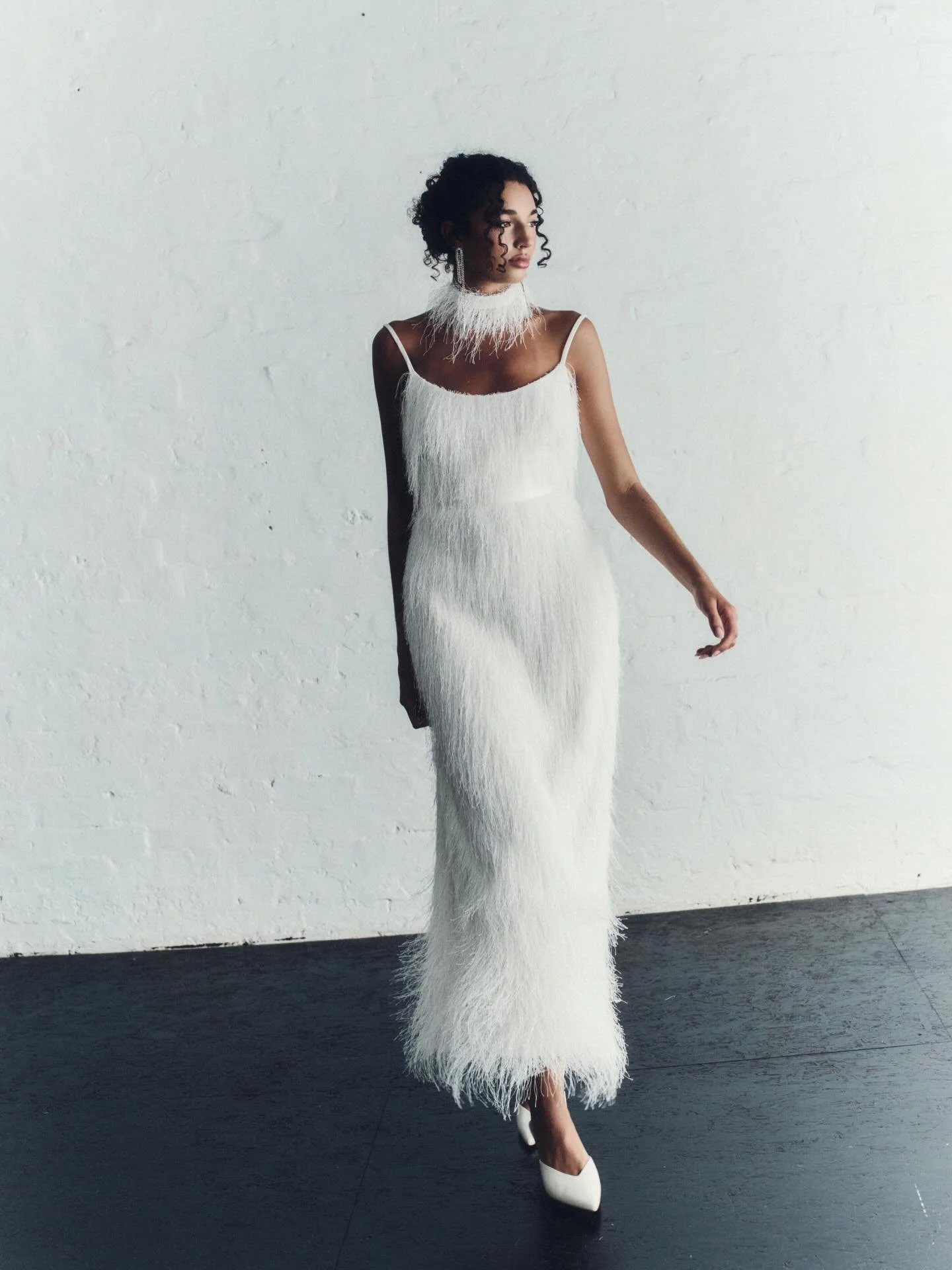 Selene //

Fringe tea length dress with fitted waist paired with out Selene fringe collar. Available to try on now at @moonstruckbride