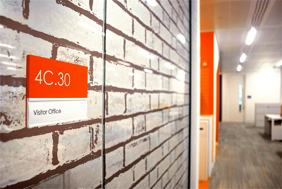 Orange sign-brick.jpg
