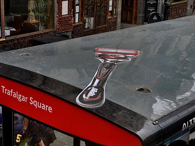 A cardboard cutout of a shaving razor.