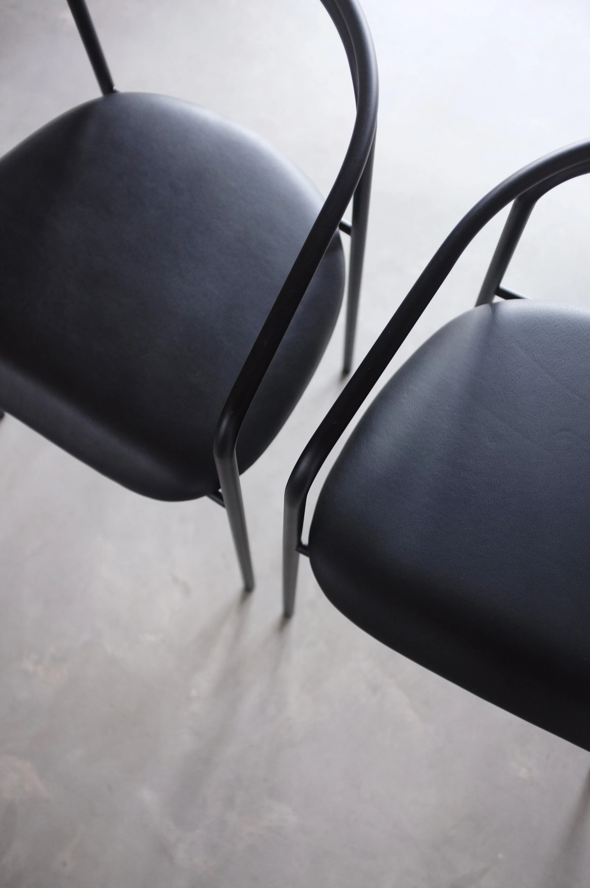 Black saddle chairs.JPG