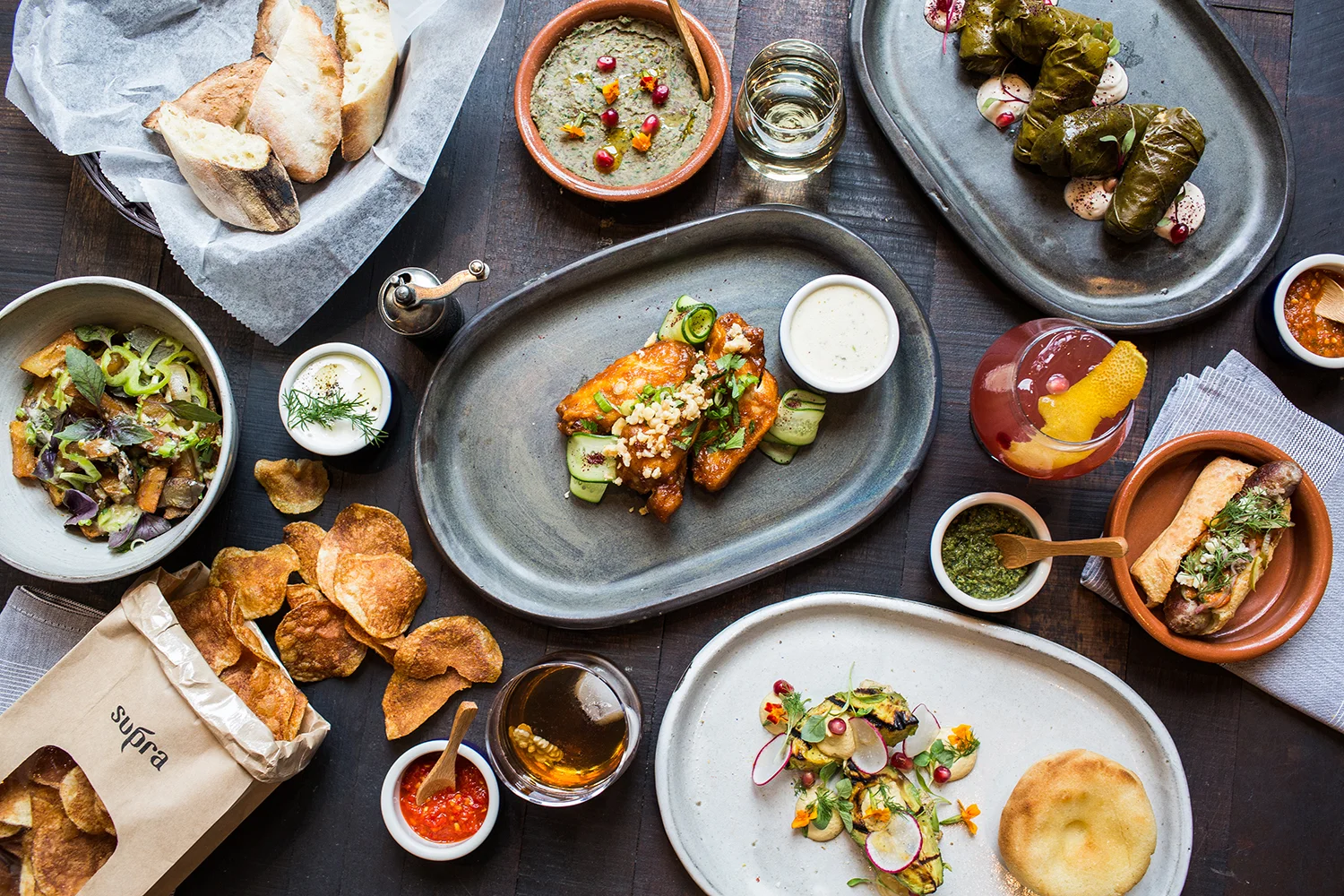 Spread of Mediterranean food at Supra in DC