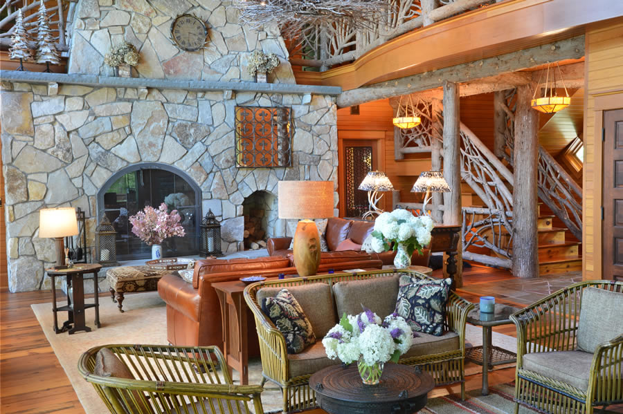 Warm living room with stone wall and staircase (Copy)