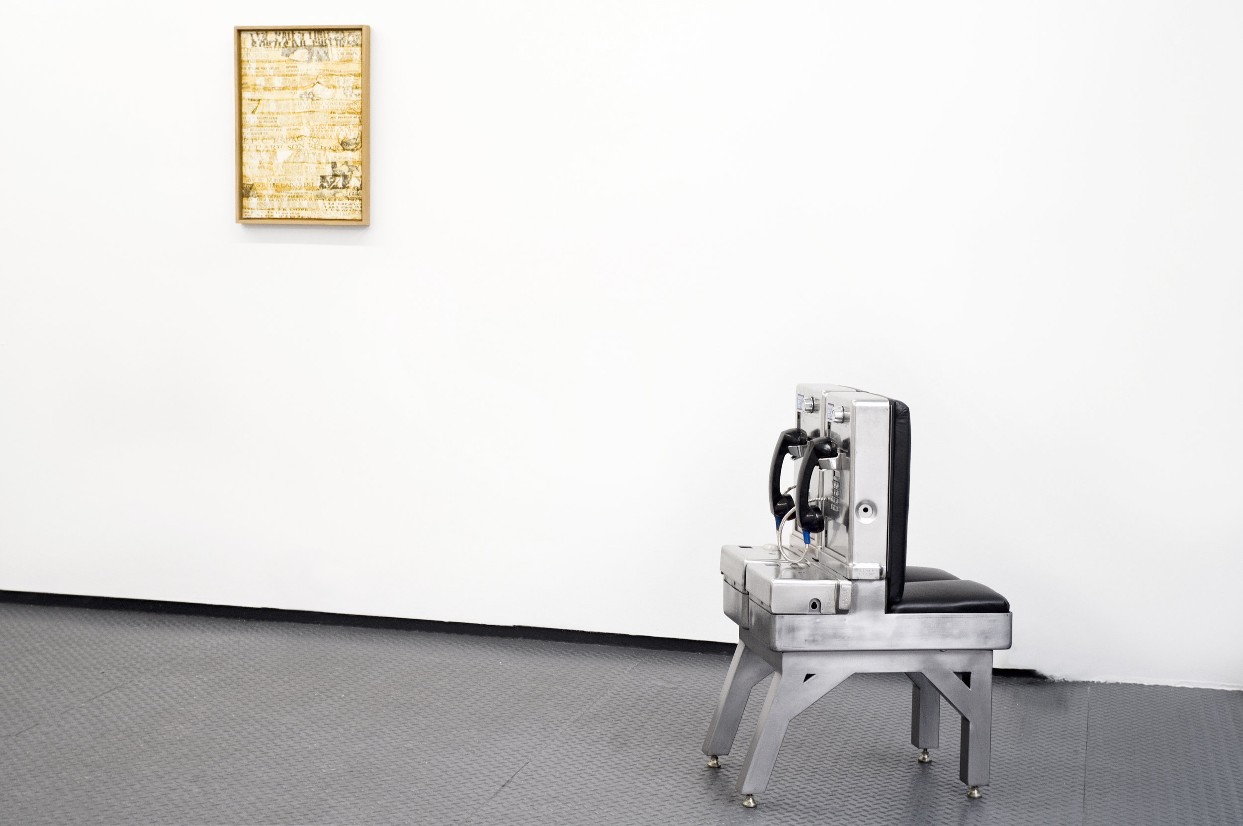 On the opposite wall, (L')EP.C. espagnol prépare son retour (Le Quotidien Déchiré), 1975 is an original piece from the Art Scotch series by French artist Gil Wolman. In 1956, he co-wrote with Guy Debord A Theory of Détournement, a text essential to the understanding of this exhibition that has been reproduced on the front page of the Alarm! newspaper. Payphone Chair is a sculpture made with two New York City decommissioned payphones that invites the viewer to sit behind a one-way mirror and look at the street without being seen.